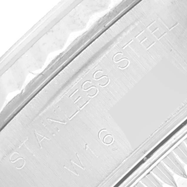 The image shows the engraved "STAINLESS STEEL" mark on the inner bezel of a Rolex Datejust 69174 Women's Stainless Steel Silver Dial 69174 Women's Stainless Steel Silver Dial watch.