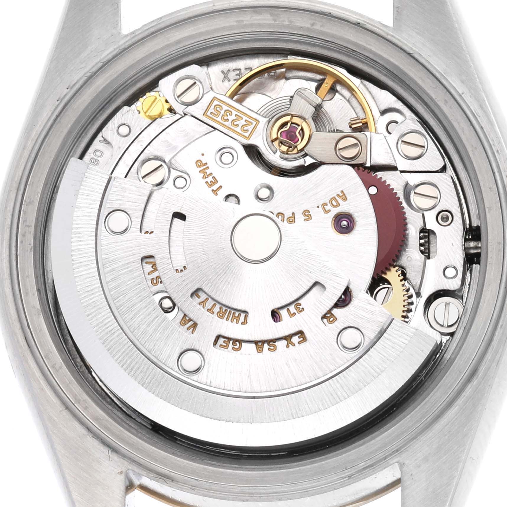 The image shows the movement from the back of a Rolex Datejust 79173 Women's Steel and Gold (two tone) Silver Dial 79173 Women's Steel and Gold (two tone) Silver Dial watch, highlighting its intricate mechanical parts.