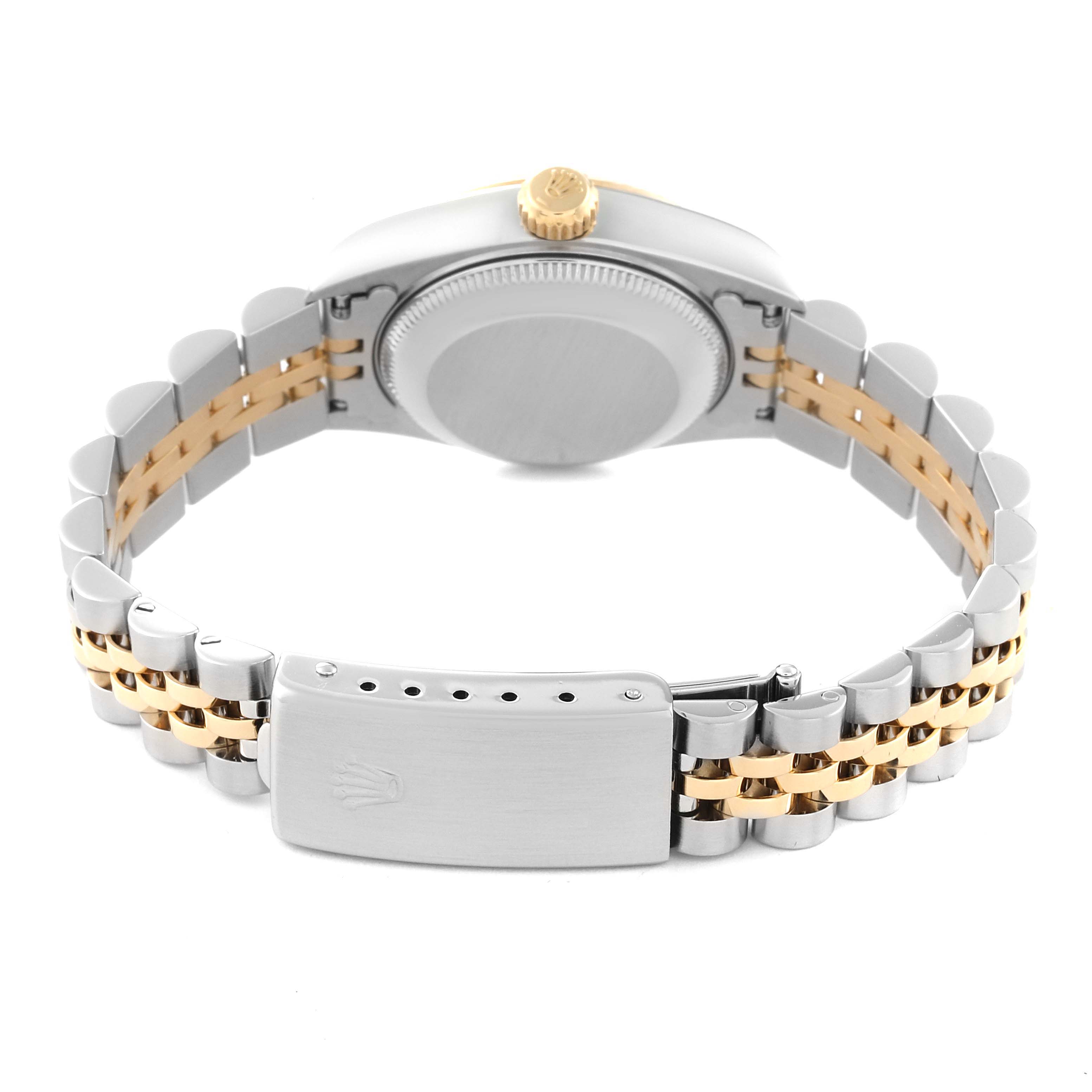 This image shows the back and clasp of a Rolex Datejust 69173 Women's Steel and Gold (two tone) Champagne Dial 69173 Women's Steel and Gold (two tone) Champagne Dial, featuring a two-tone bracelet and closed case back.