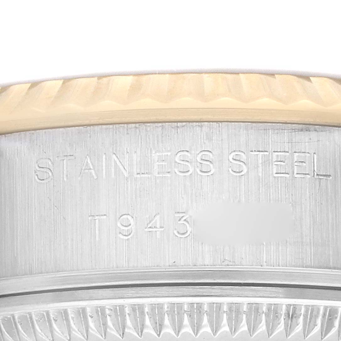 The image shows a close-up view of the bezel and case side of a Rolex Datejust 69173 Women's Steel and Gold (two tone) Champagne Dial 69173 Women's Steel and Gold (two tone) Champagne Dial watch, highlighting the material "Stainless Steel".