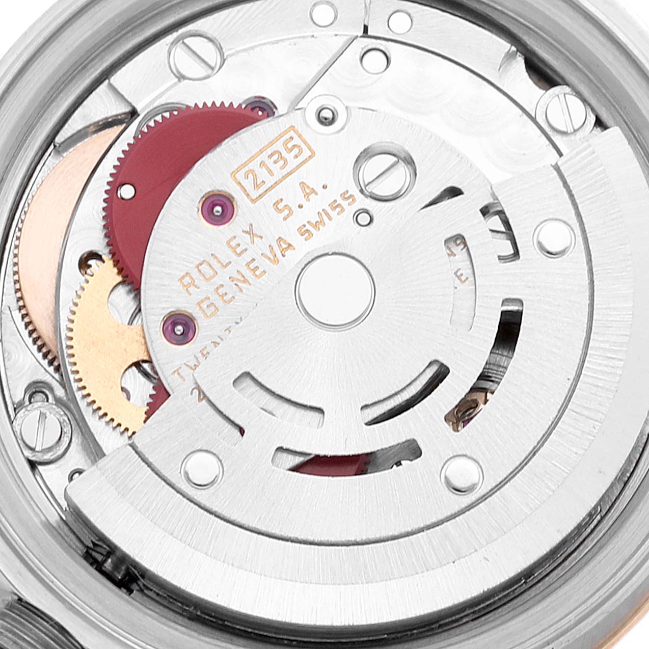 This image shows the internal mechanism of a Rolex Datejust 69173 Women's Steel and Gold (two tone) Beige Dial 69173 Women's Steel and Gold (two tone) Beige Dial watch, featuring gears and the rotor.