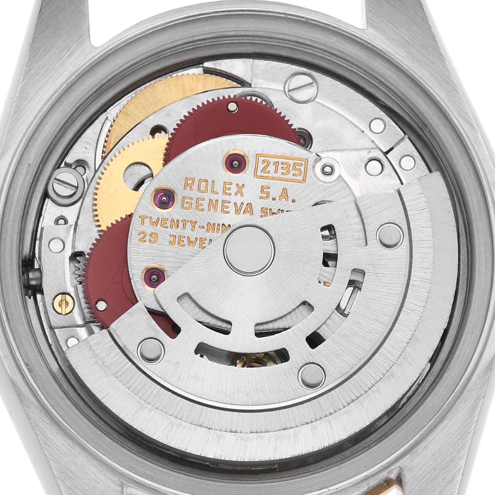This image shows the movement of a Rolex Datejust 69173 Women's Steel and Gold (two tone) White Dial 69173 Women's Steel and Gold (two tone) White Dial watch from the back, highlighting the rotor and gears.