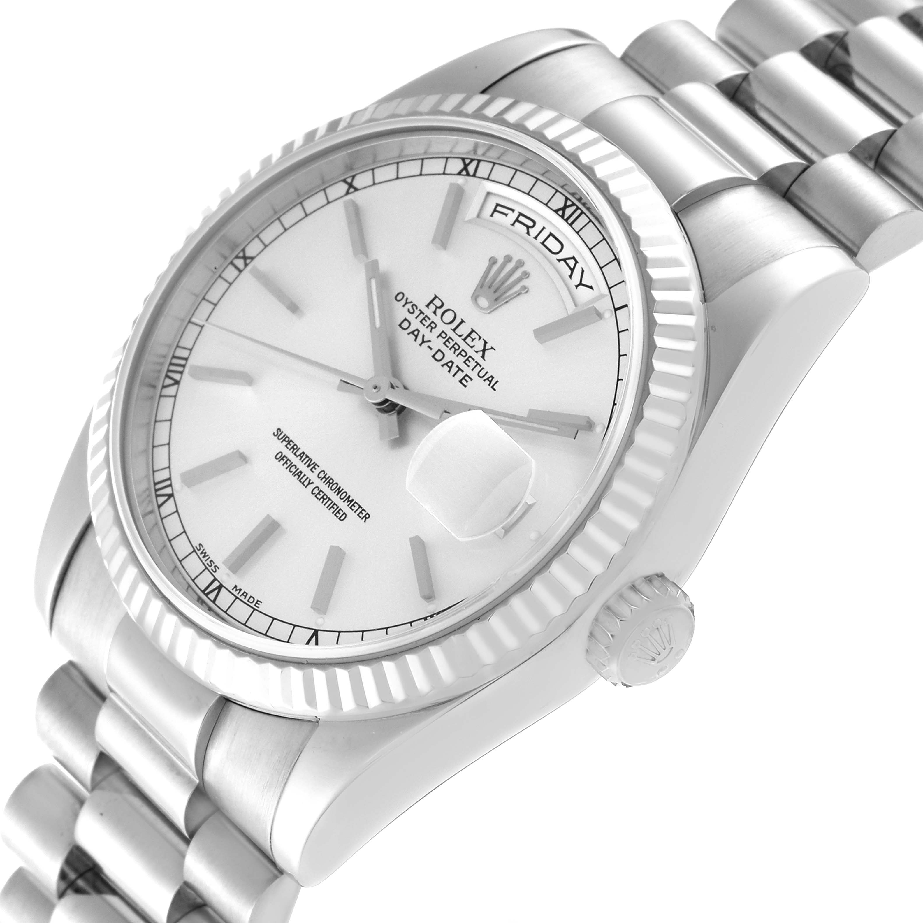 The Rolex President OFFICIALLY CERTIFIED CHRONOMETER SELF-WINDING MOVEMENT. Men's White Gold Silver Dial OFFICIALLY CERTIFIED CHRONOMETER SELF-WINDING MOVEMENT. Men's White Gold Silver Dial model watch is shown at an oblique angle, highlighting its dial, bezel, bracelet, and crown.