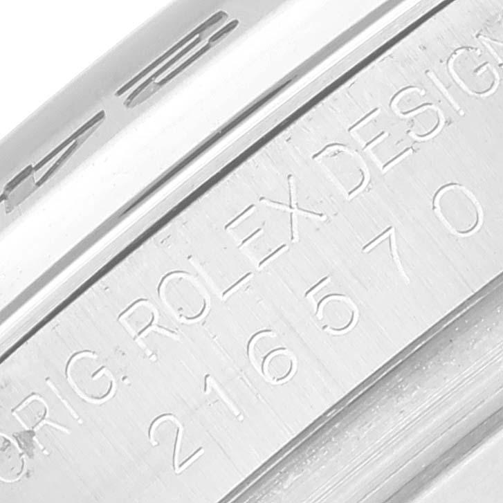 This image shows a close-up of the side engraving on the Rolex Explorer 216570 Men
s Stainless Steel Black Dial 216570 Men
s Stainless Steel Black Dial model.
