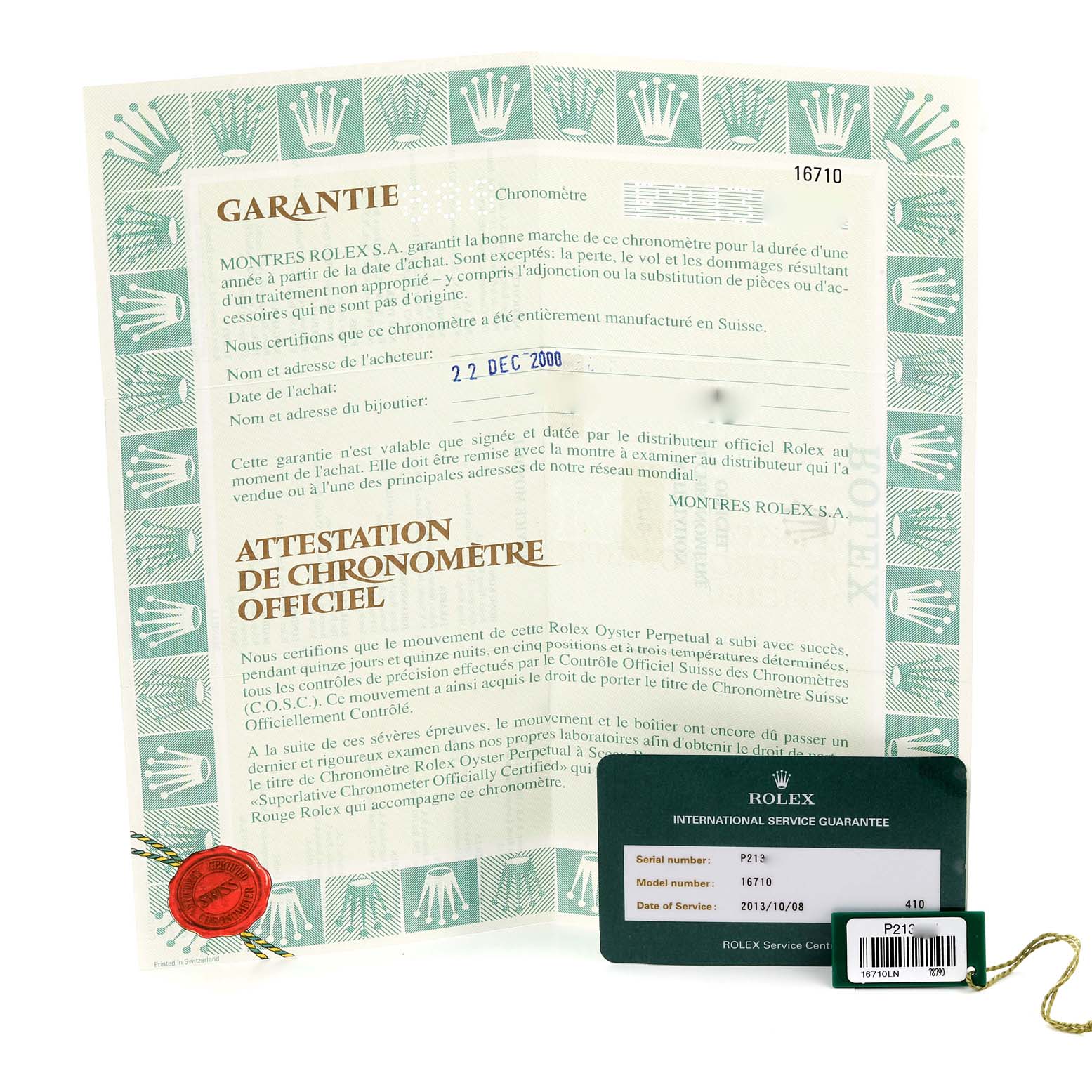 The image shows the warranty booklet and international service guarantee card for a Rolex GMT-Master 16710 Men
s Stainless Steel Black Dial 16710 Men
s Stainless Steel Black Dial model.