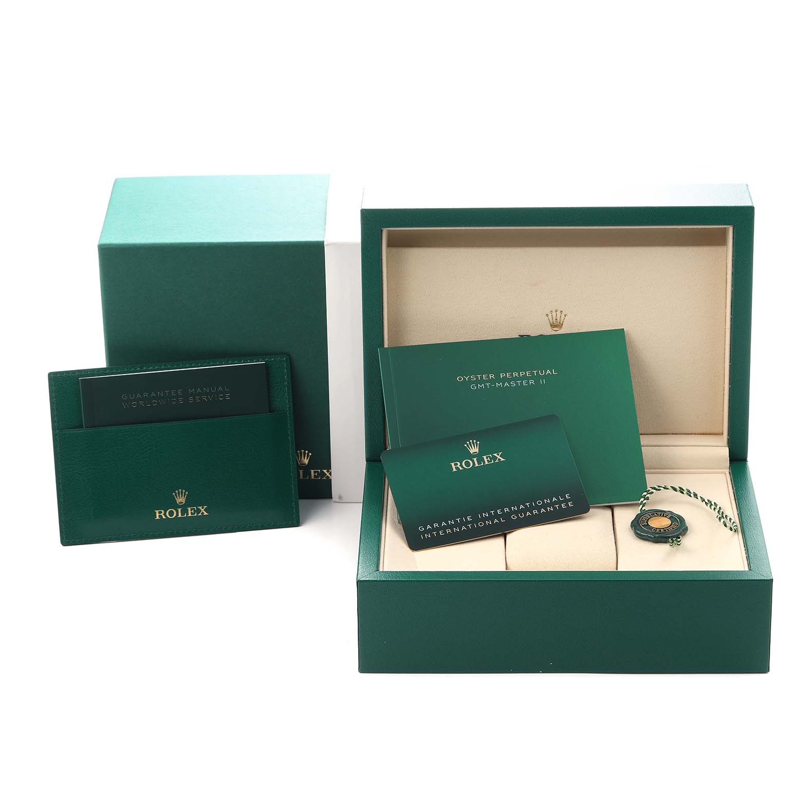 The image shows the Rolex GMT-Master 126710GRNR Men
s Stainless Steel Black Dial 126710GRNR Men
s Stainless Steel Black Dial
s box, warranty card, manuals, and a tag, viewed from the front.