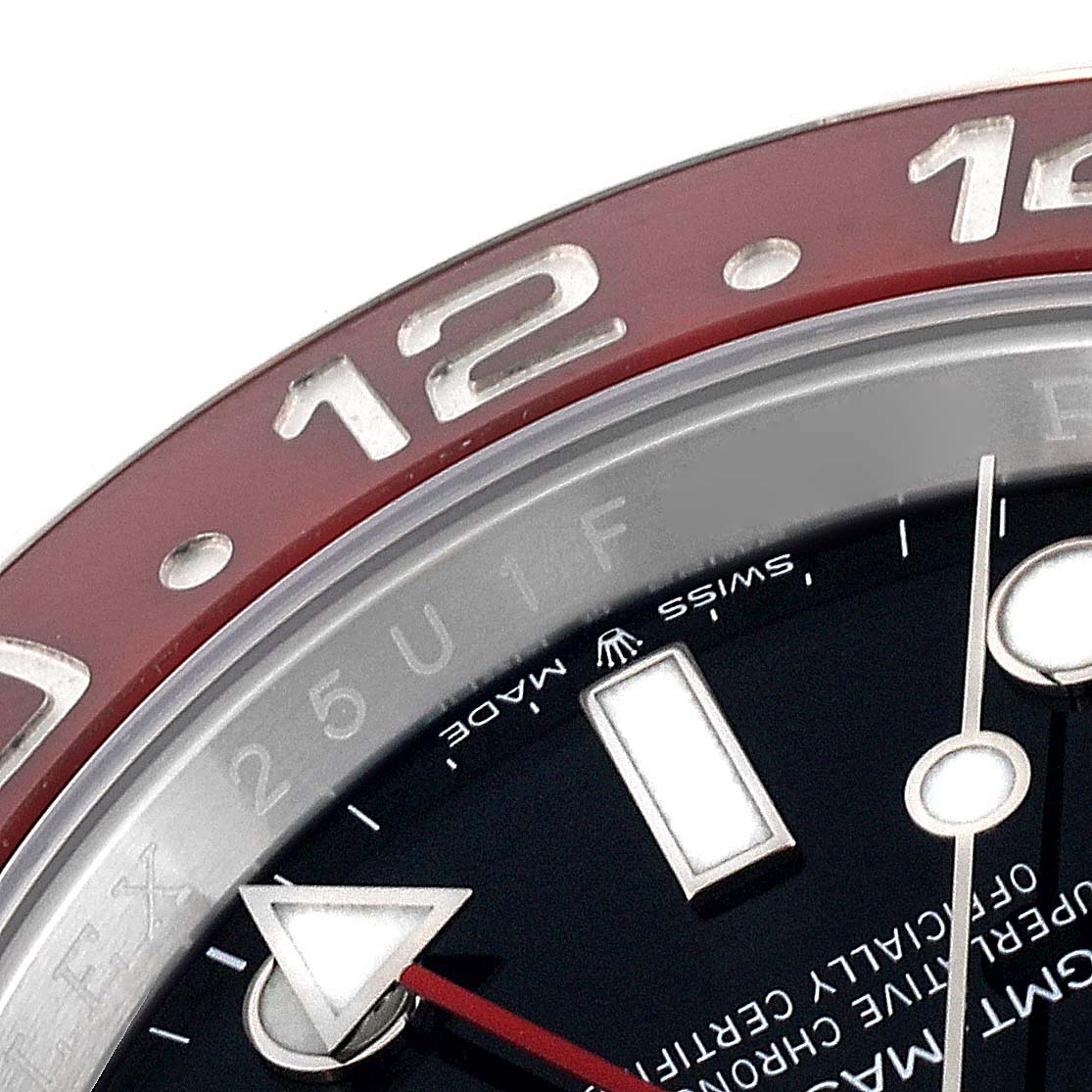 The image shows a close-up of the bezel, hour markers, and hands of a Rolex GMT-Master 126710 Men
s Stainless Steel Black Dial 126710 Men
s Stainless Steel Black Dial watch, highlighting the 12 o
clock marker.