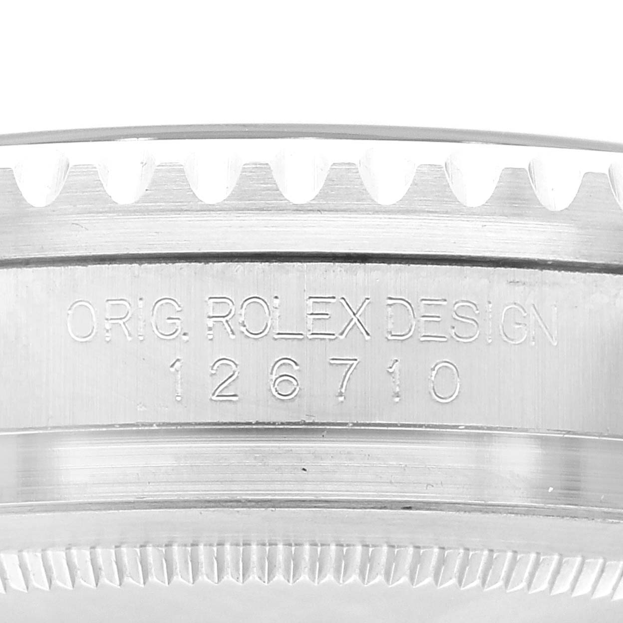 The image shows a close-up angle of the model number engraving on the case side of a Rolex GMT-Master 126710 Men
s Stainless Steel Black Dial 126710 Men
s Stainless Steel Black Dial watch.