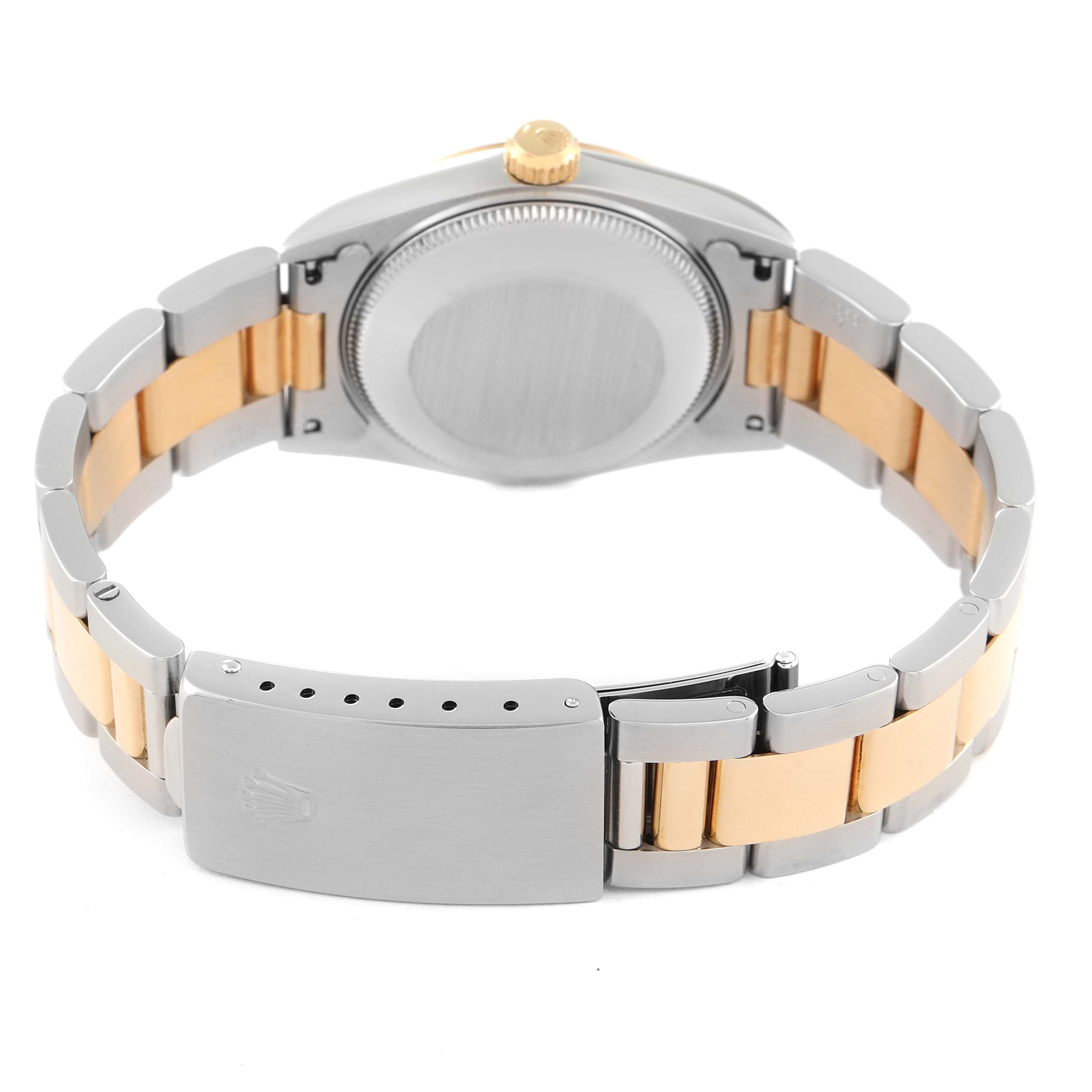 This image shows the back of the case, crown, and clasp of a Mid-Size Rolex watch.