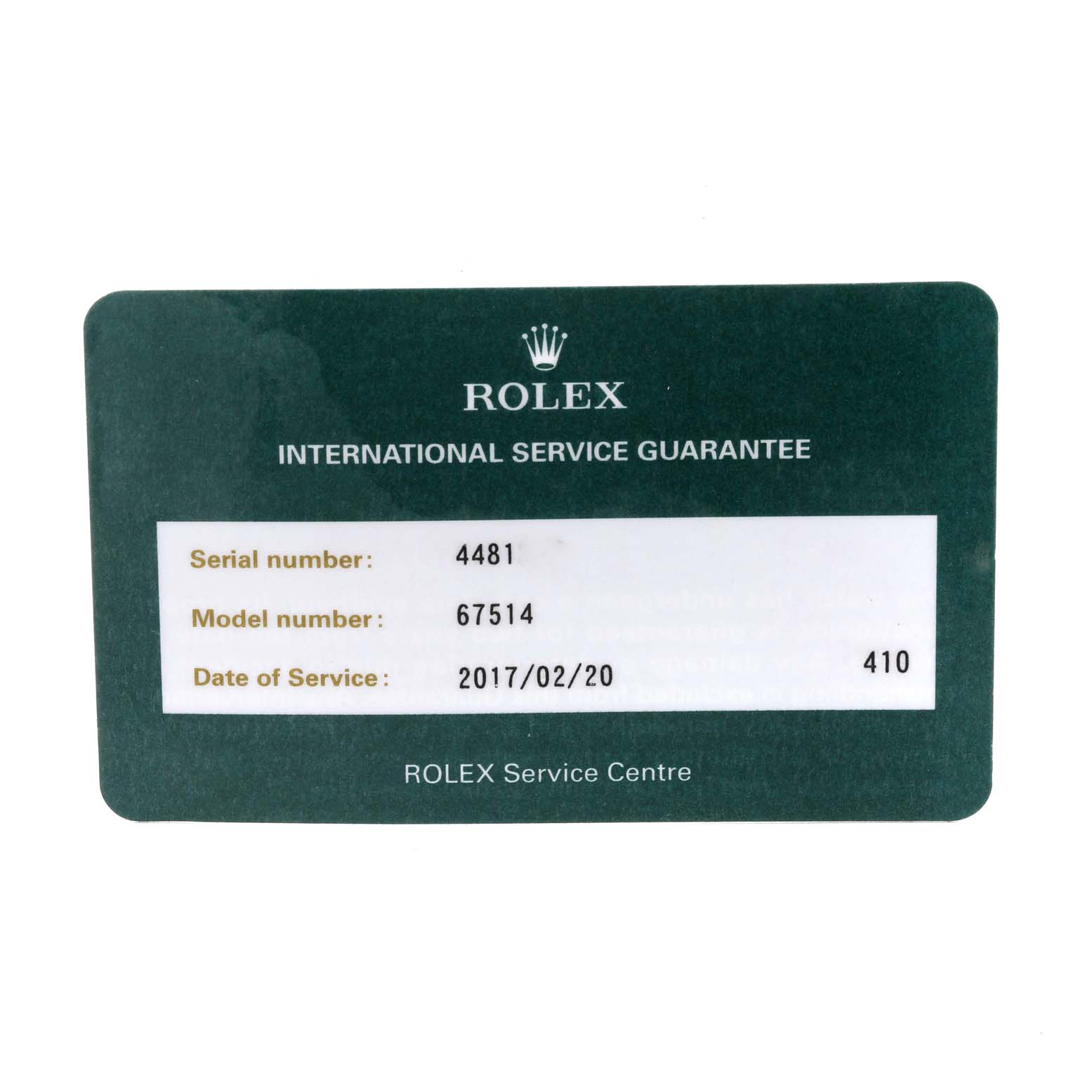 This image shows an International Service Guarantee card for a Rolex Mid-Size 67514 Women
s Stainless Steel Blue Dial 67514 Women
s Stainless Steel Blue Dial model with a serial number and date of service.