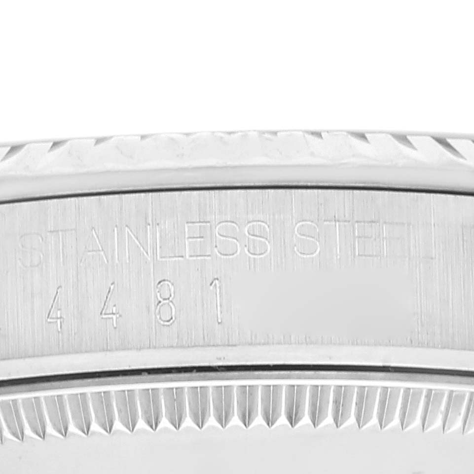 This image showcases the engraved details on the stainless steel case back of a Rolex Mid-Size 67514 Women
s Stainless Steel Blue Dial 67514 Women
s Stainless Steel Blue Dial model watch.