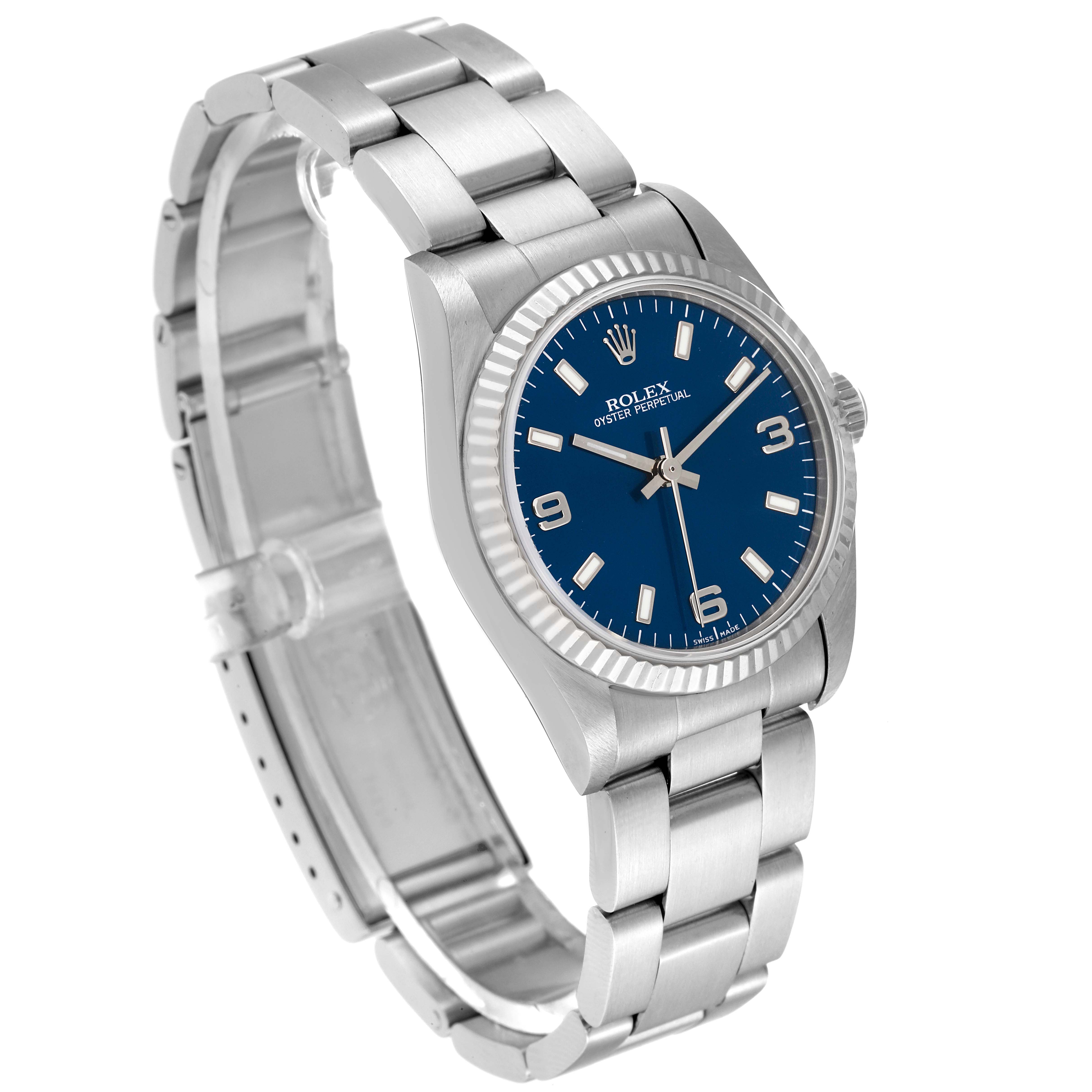 This image shows the front and side of a Rolex Mid-Size 67514 Women
s Stainless Steel Blue Dial 67514 Women
s Stainless Steel Blue Dial Oyster Perpetual watch.