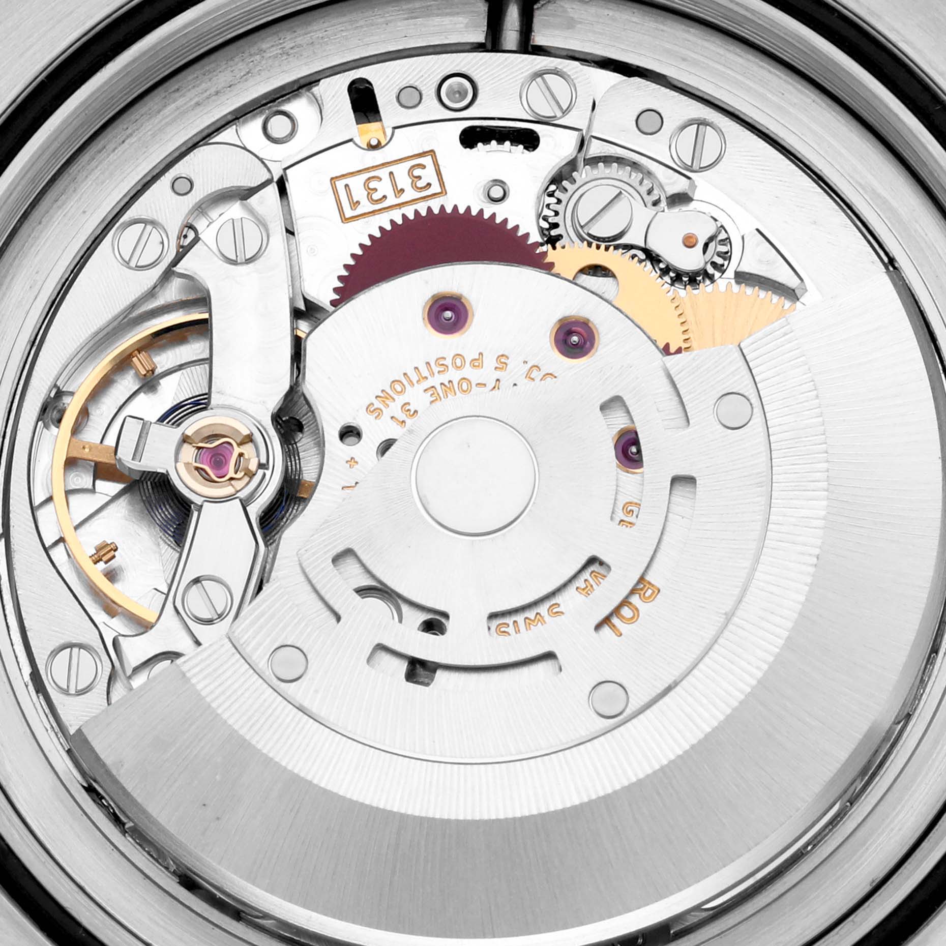 This image shows a close-up view of the Rolex Milgauss 116400 Men's Stainless Steel White Dial 116400 Men's Stainless Steel White Dial watch movement, highlighting its intricate gears, wheels, and mechanical parts.