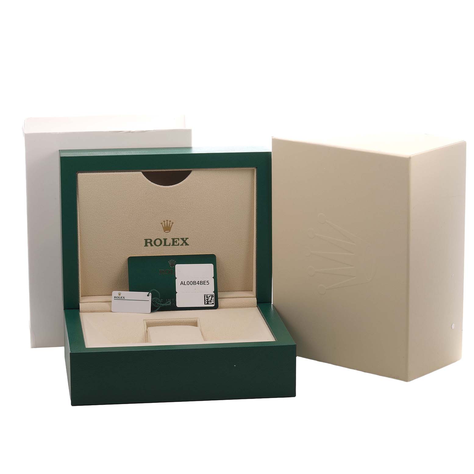 The image shows an open Rolex Oyster Perpetual 126000 Men's Stainless Steel Silver Dial box with authenticity cards, viewed from the front.
