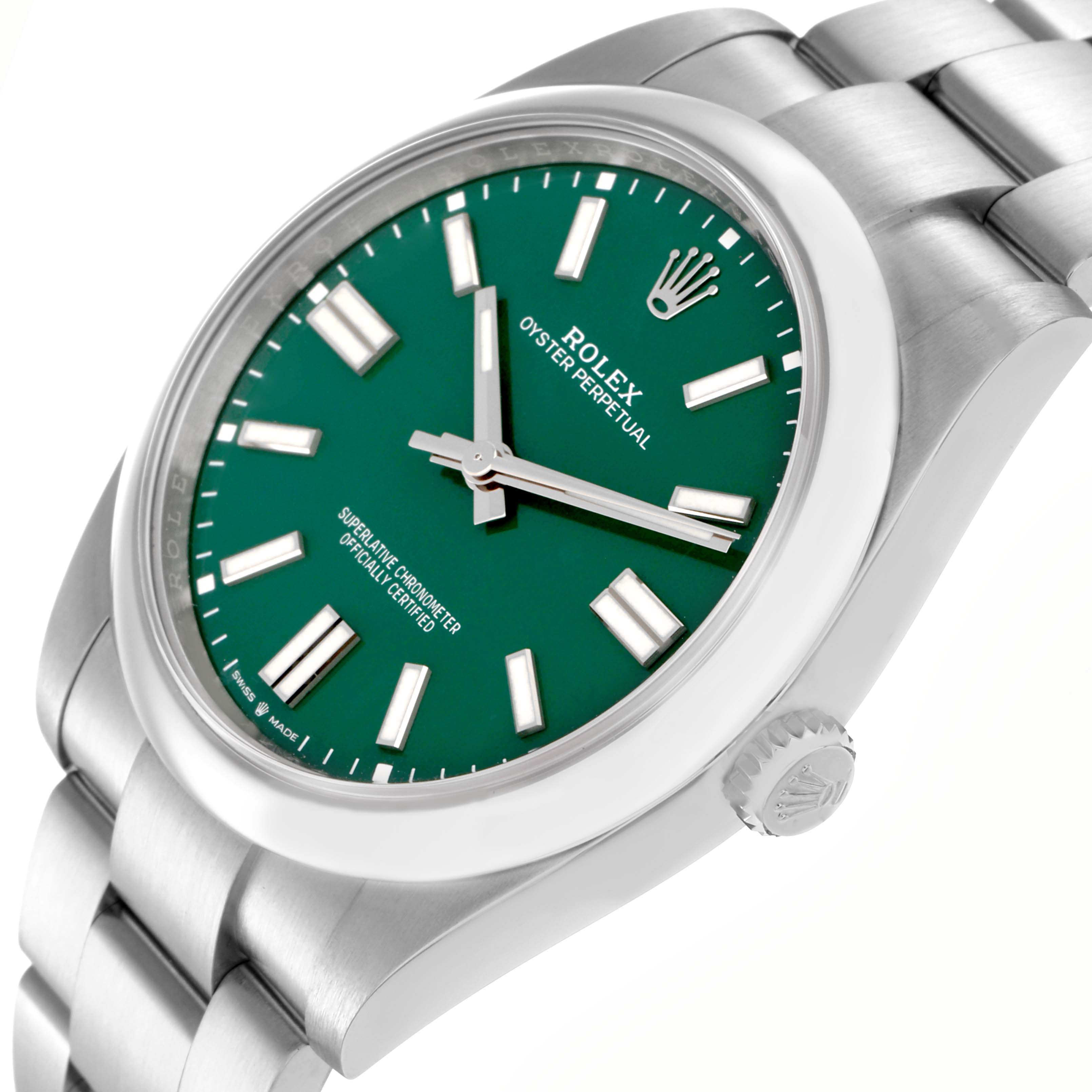 The Rolex Oyster Perpetual 124300 Men
s Stainless Steel Green Dial 124300 Men
s Stainless Steel Green Dial is shown at a slight side angle, featuring the green dial, hands, crown, and part of the bracelet.