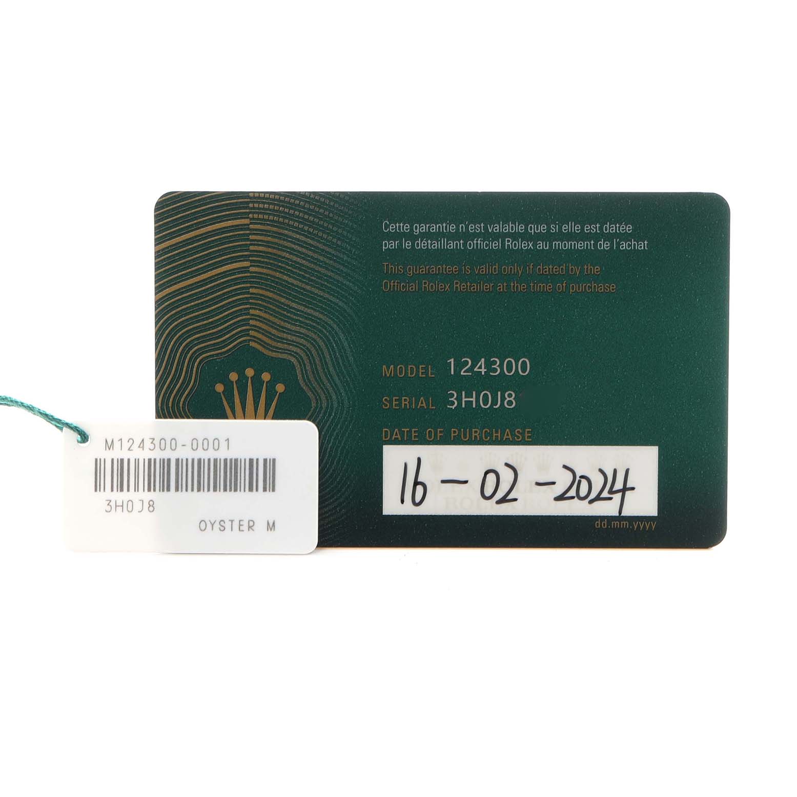 The image shows a warranty card and tag for the Oyster Perpetual model by Rolex.