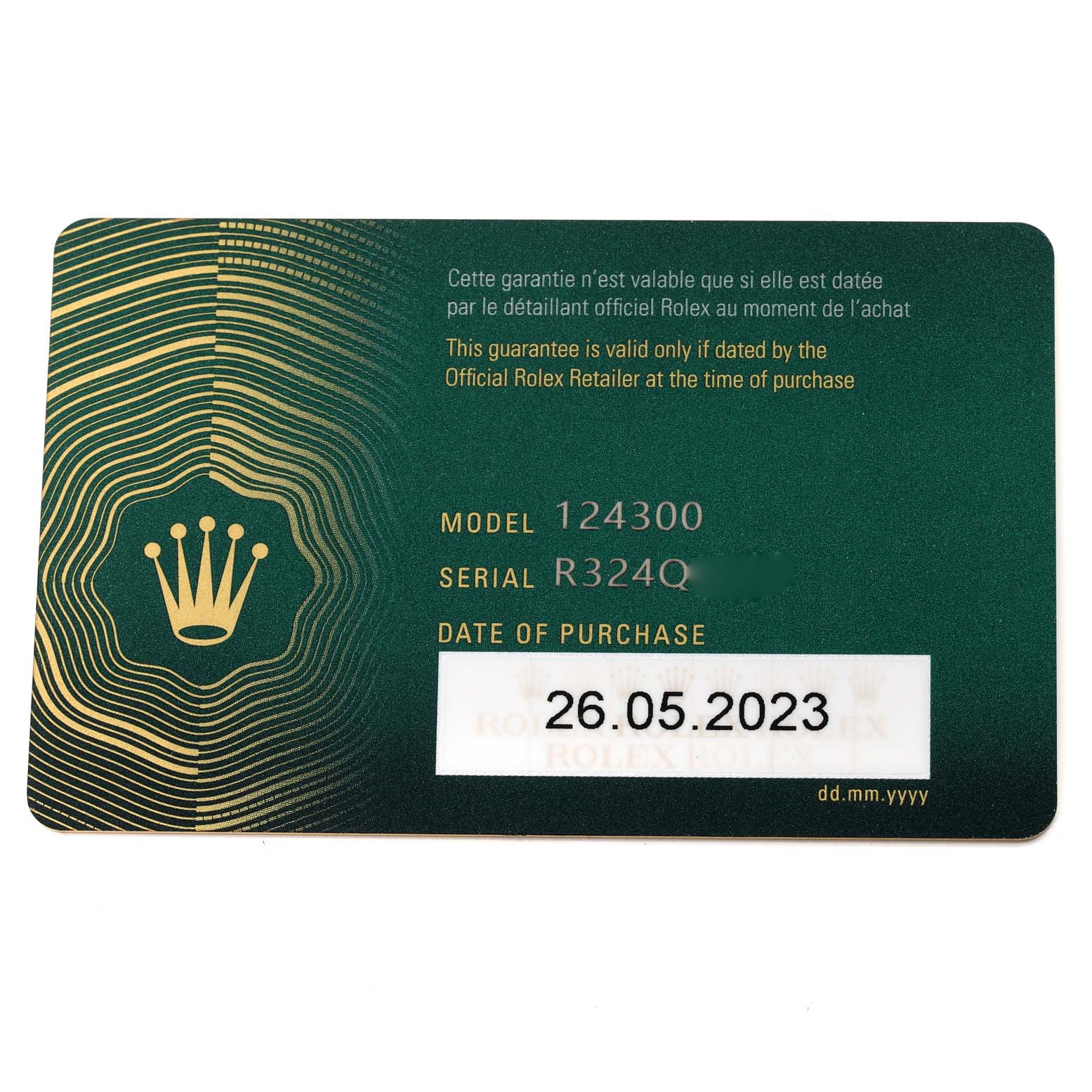 This image shows a warranty card for the Rolex Oyster Perpetual 124300 Men's Stainless Steel Black Dial 124300 Men's Stainless Steel Black Dial model 124300.