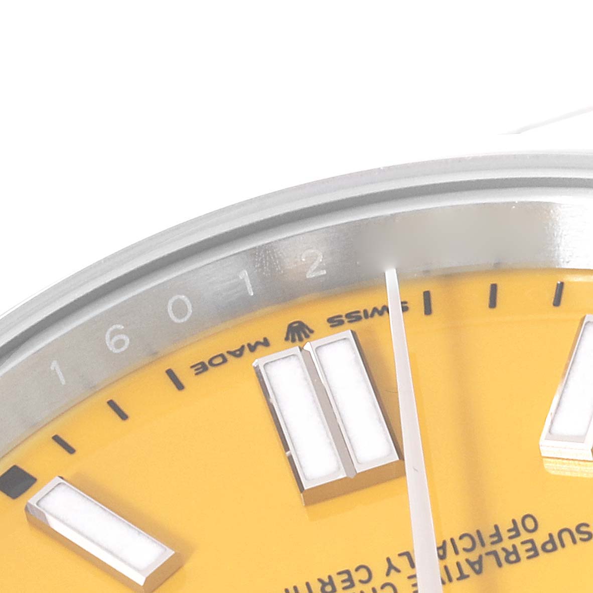 The image shows a close-up of the yellow dial, hands, and part of the bezel of a Rolex Oyster Perpetual 124300 Men
s Stainless Steel Yellow Dial 124300 Men
s Stainless Steel Yellow Dial watch.