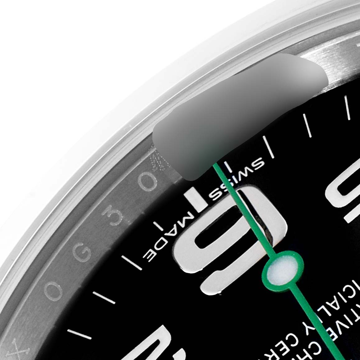 This close-up image shows the dial and part of the bezel of a Rolex Air-King 116900 Men's Stainless Steel Black Dial 116900 Men's Stainless Steel Black Dial watch.