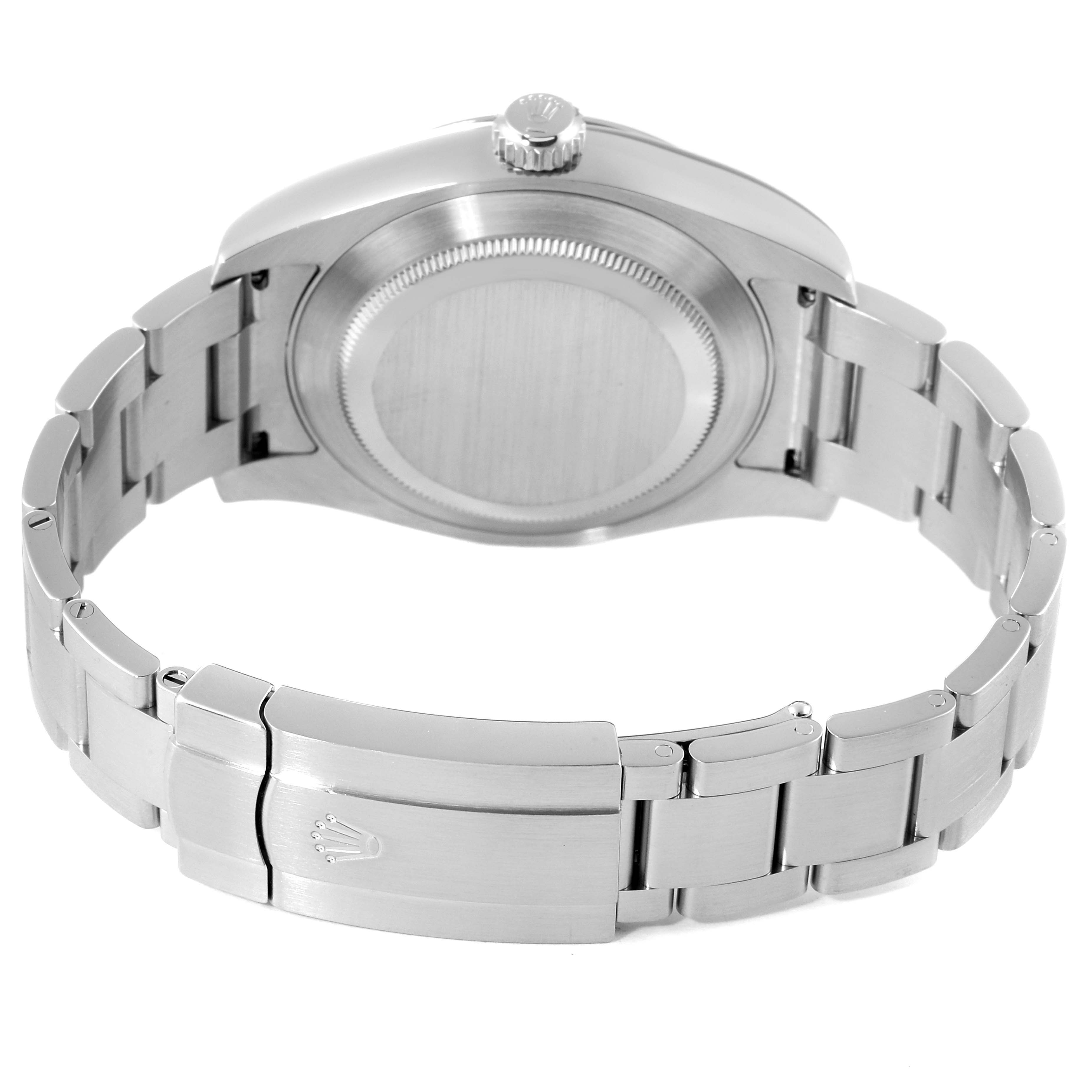 This image shows the back of the Rolex Air-King 116900 Men's Stainless Steel Black Dial 116900 Men's Stainless Steel Black Dial watch and its metal bracelet.