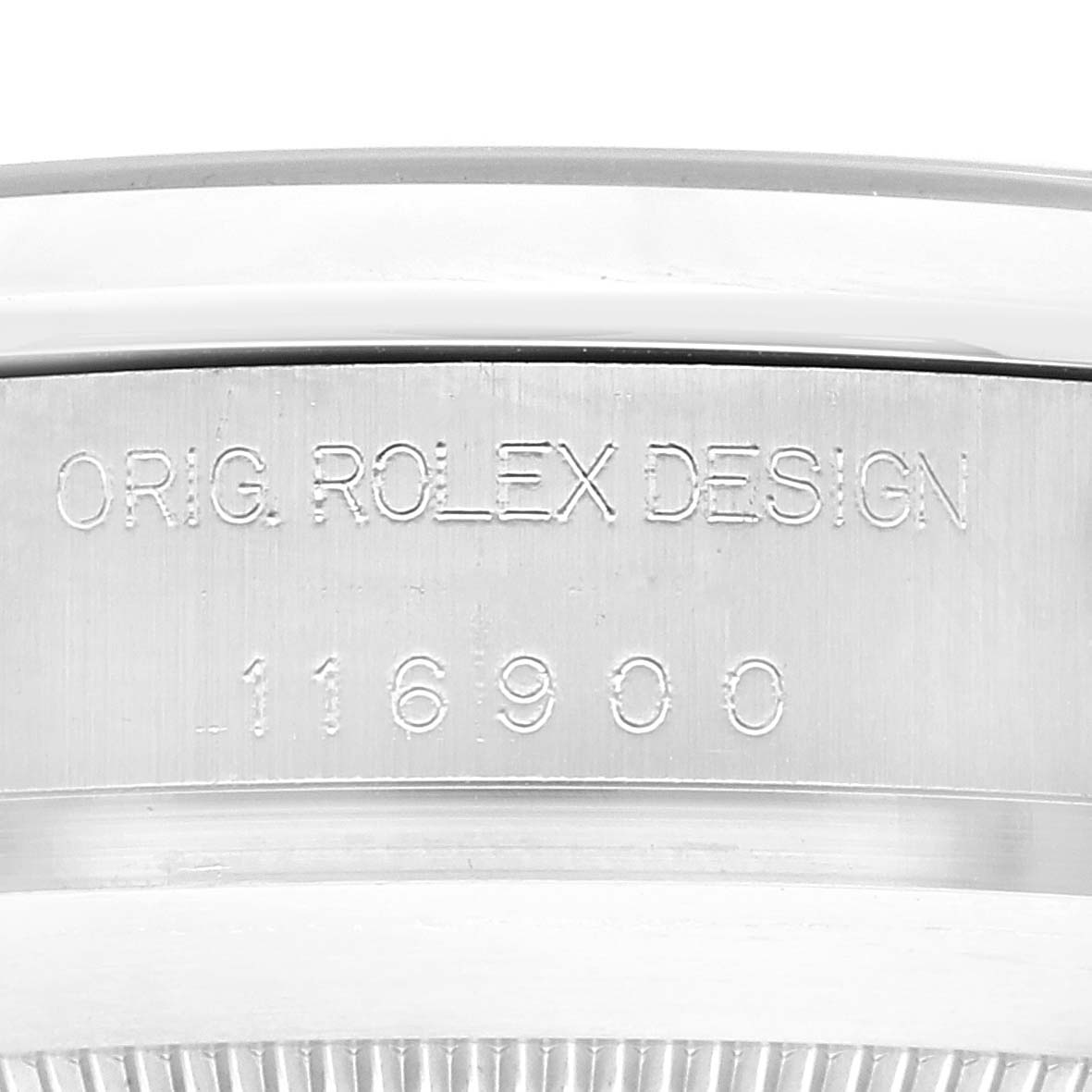 This image shows a close-up of the case's side engraving on a Rolex Air-King 116900 Men's Stainless Steel Black Dial 116900 Men's Stainless Steel Black Dial model, showing the serial number and design inscription.