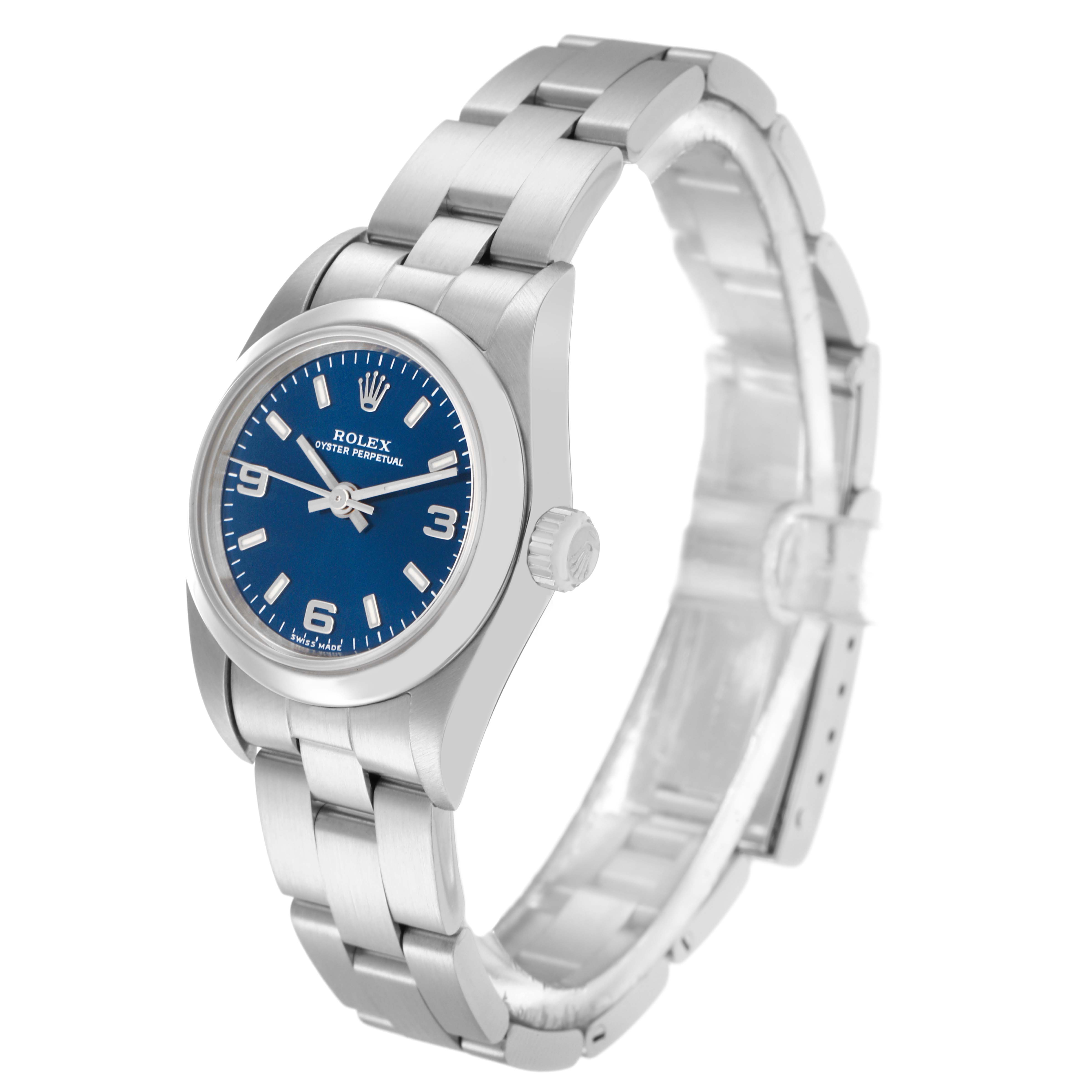 The Rolex Oyster Perpetual 76080 Women
s Stainless Steel Blue Dial 76080 Women
s Stainless Steel Blue Dial watch is shown at a slight angle, displaying the dial, bezel, crown, and bracelet.