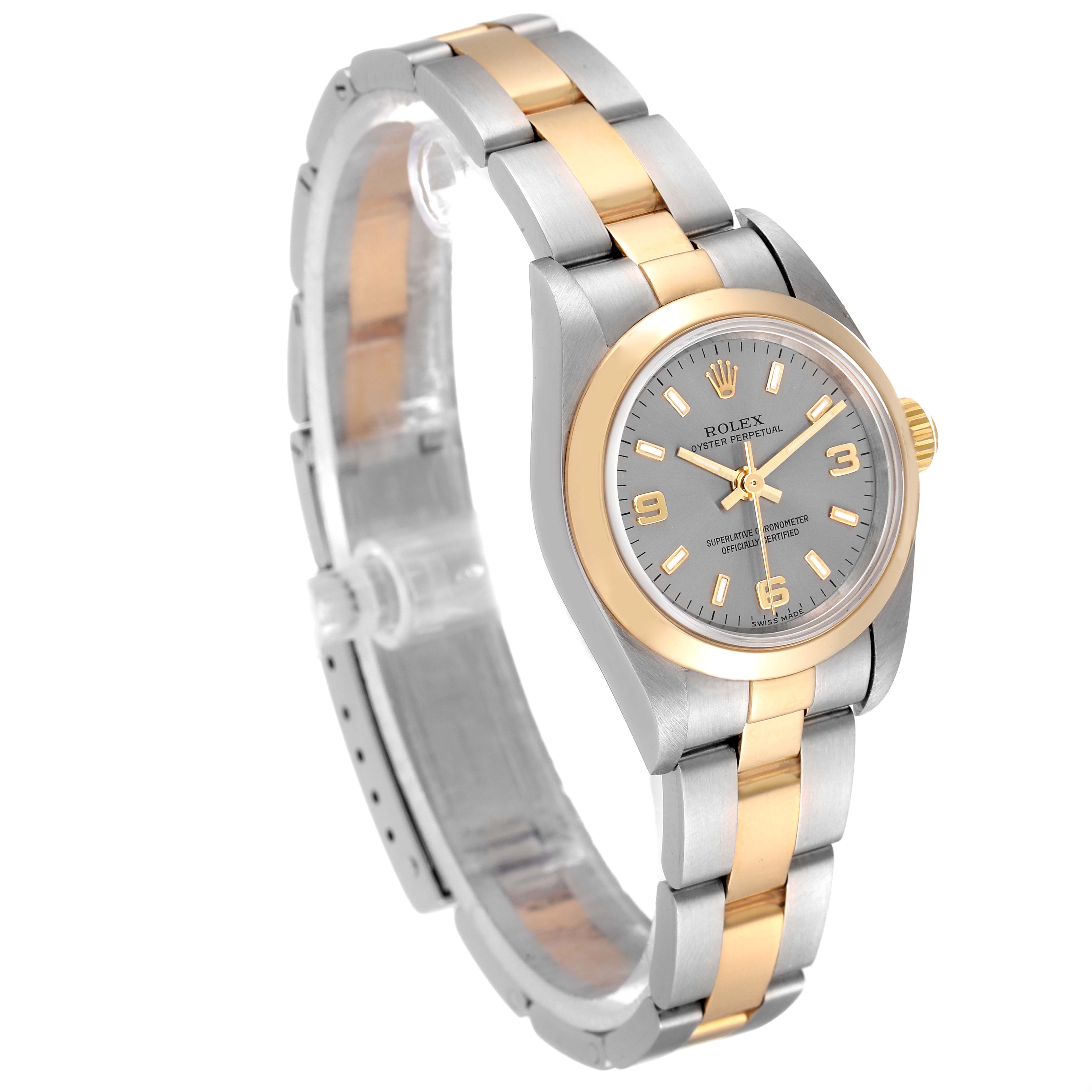 The Rolex Oyster Perpetual 76183 Women
s Steel and Gold (two tone) Grey Dial 76183 Women
s Steel and Gold (two tone) Grey Dial watch is shown at a slight angle, displaying its dual-tone bracelet and face.