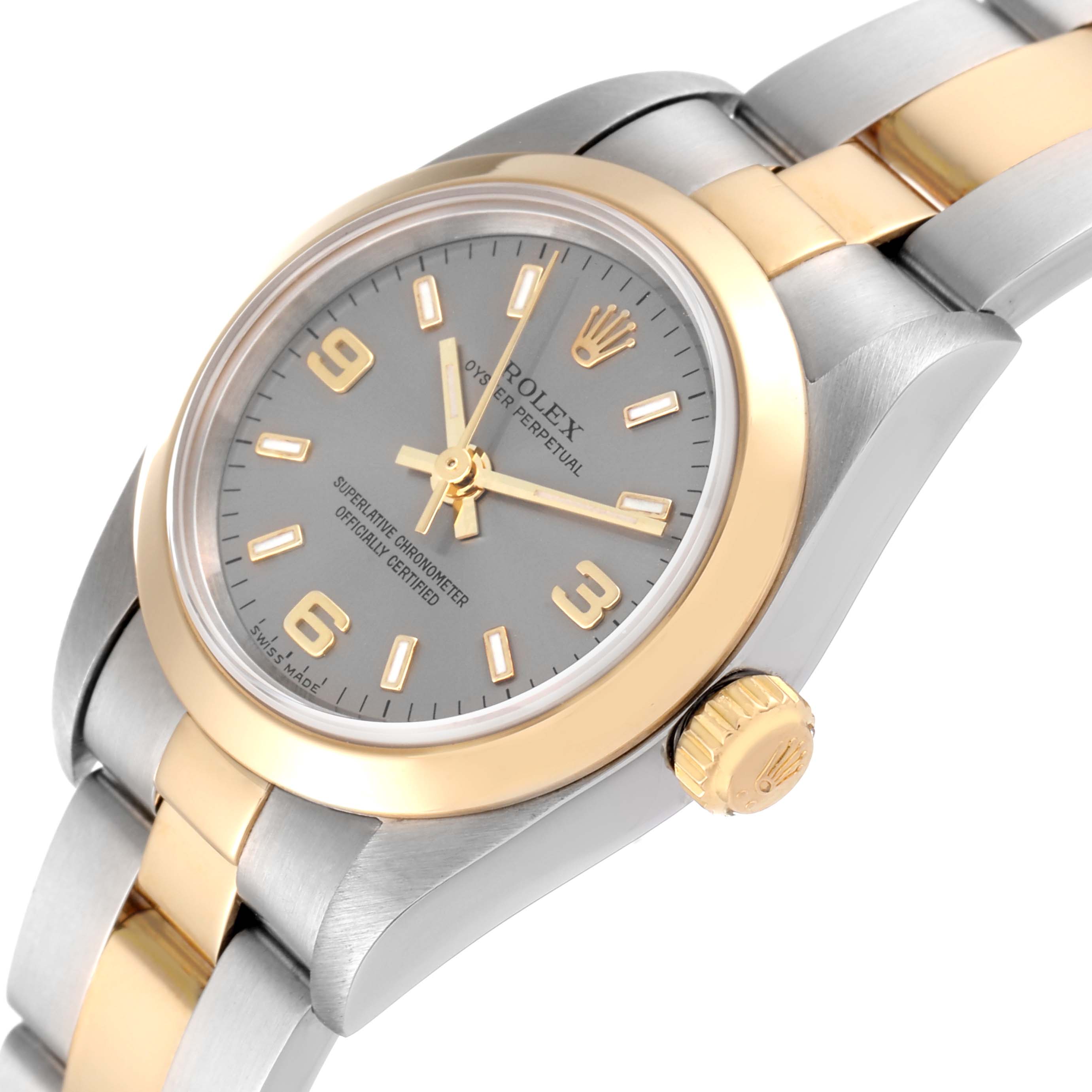 This Rolex Oyster Perpetual 76183 Women
s Steel and Gold (two tone) Grey Dial 76183 Women
s Steel and Gold (two tone) Grey Dial watch is shown at a slight diagonal angle, highlighting the face, bezel, crown, and part of the bracelet.
