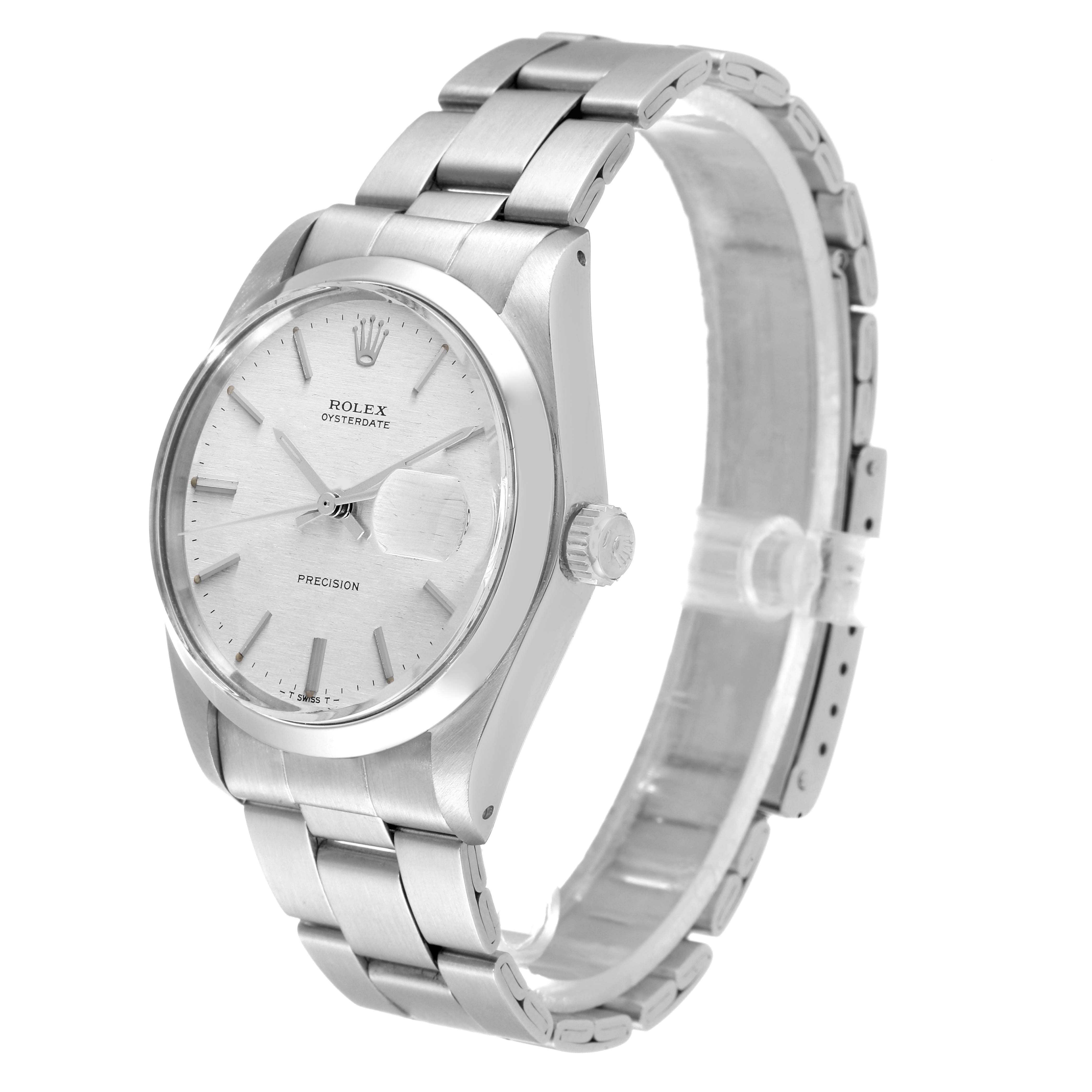 The image shows a side angle of the Rolex Vintage Collection 6694 Men's Stainless Steel Silver Dial 6694 Men's Stainless Steel Silver Dial watch, highlighting the dial, crown, and stainless steel bracelet.