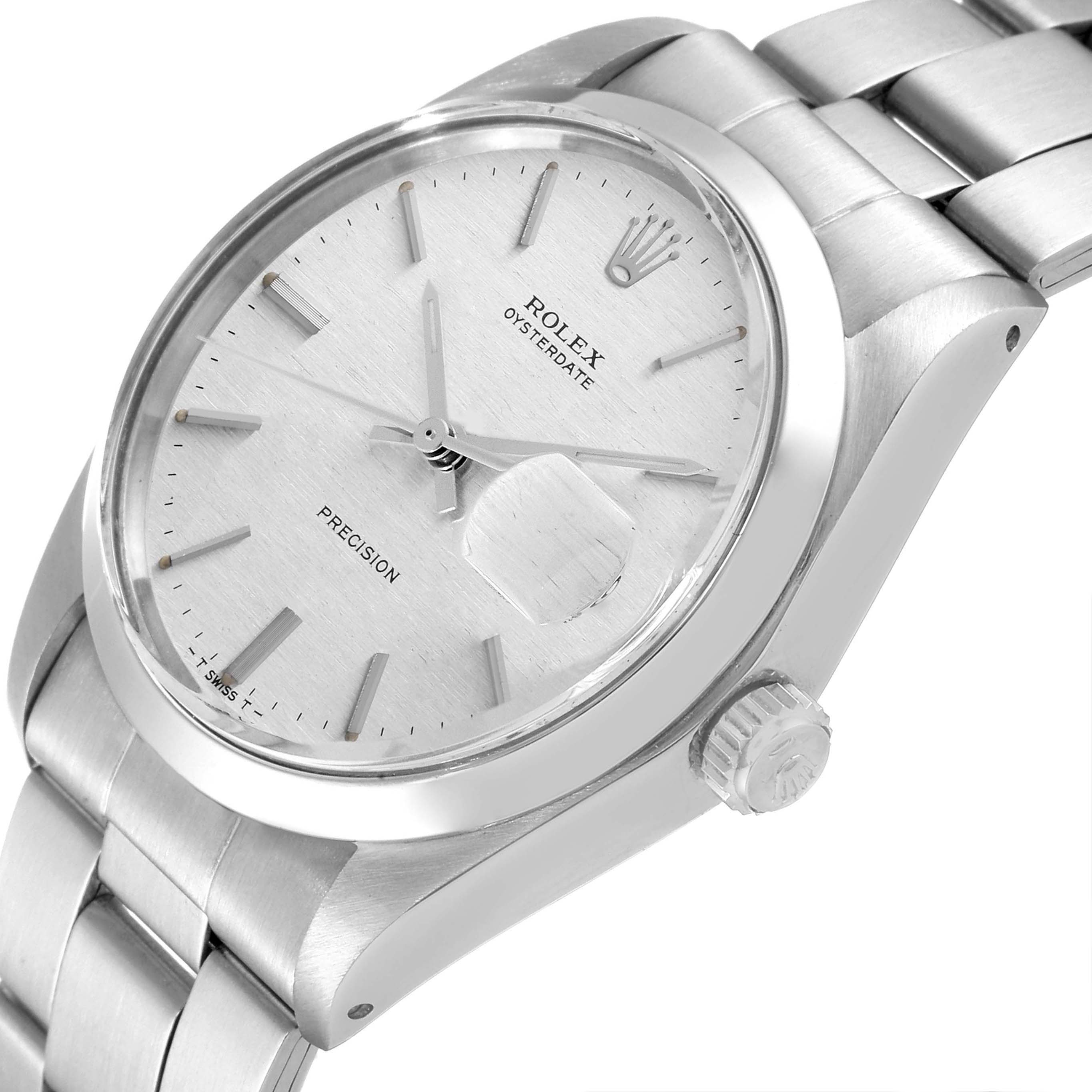 This image shows a silver Rolex Vintage Collection 6694 Men's Stainless Steel Silver Dial 6694 Men's Stainless Steel Silver Dial Oysterdate model watch, including its dial, bezel, bracelet, and crown, at an angle.