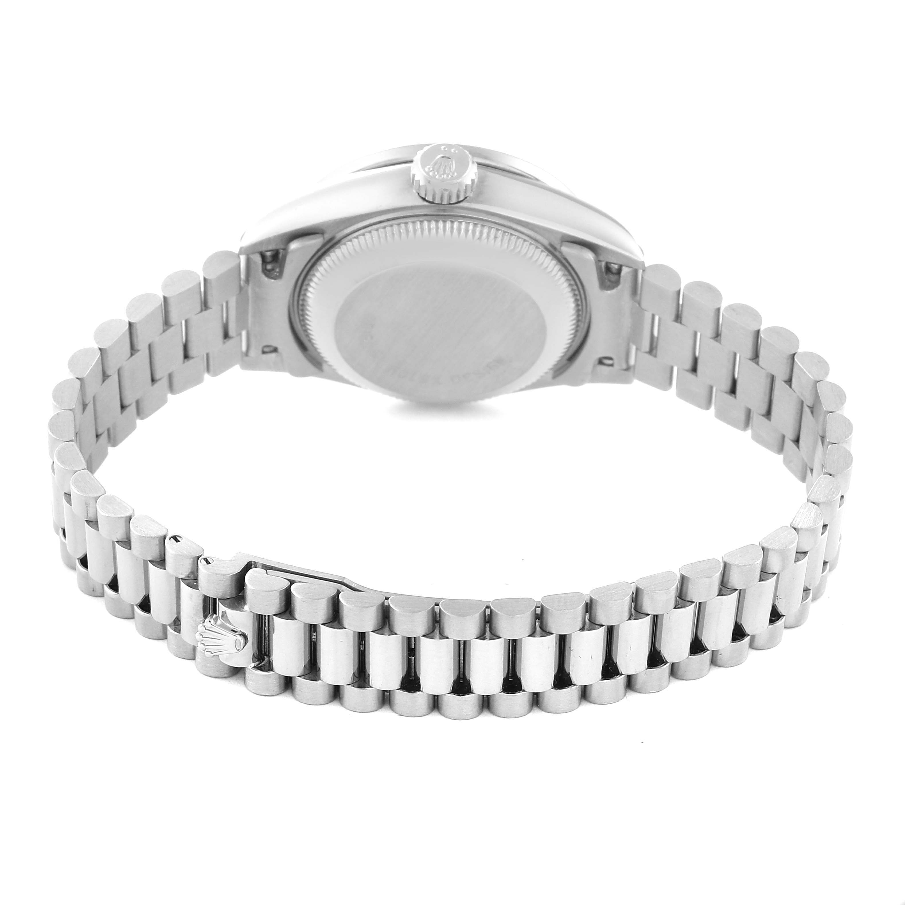 The image shows the back view of a Rolex President 69139 Women's White Gold Blue Dial 69139 Women's White Gold Blue Dial model watch, focusing on the case back and bracelet.