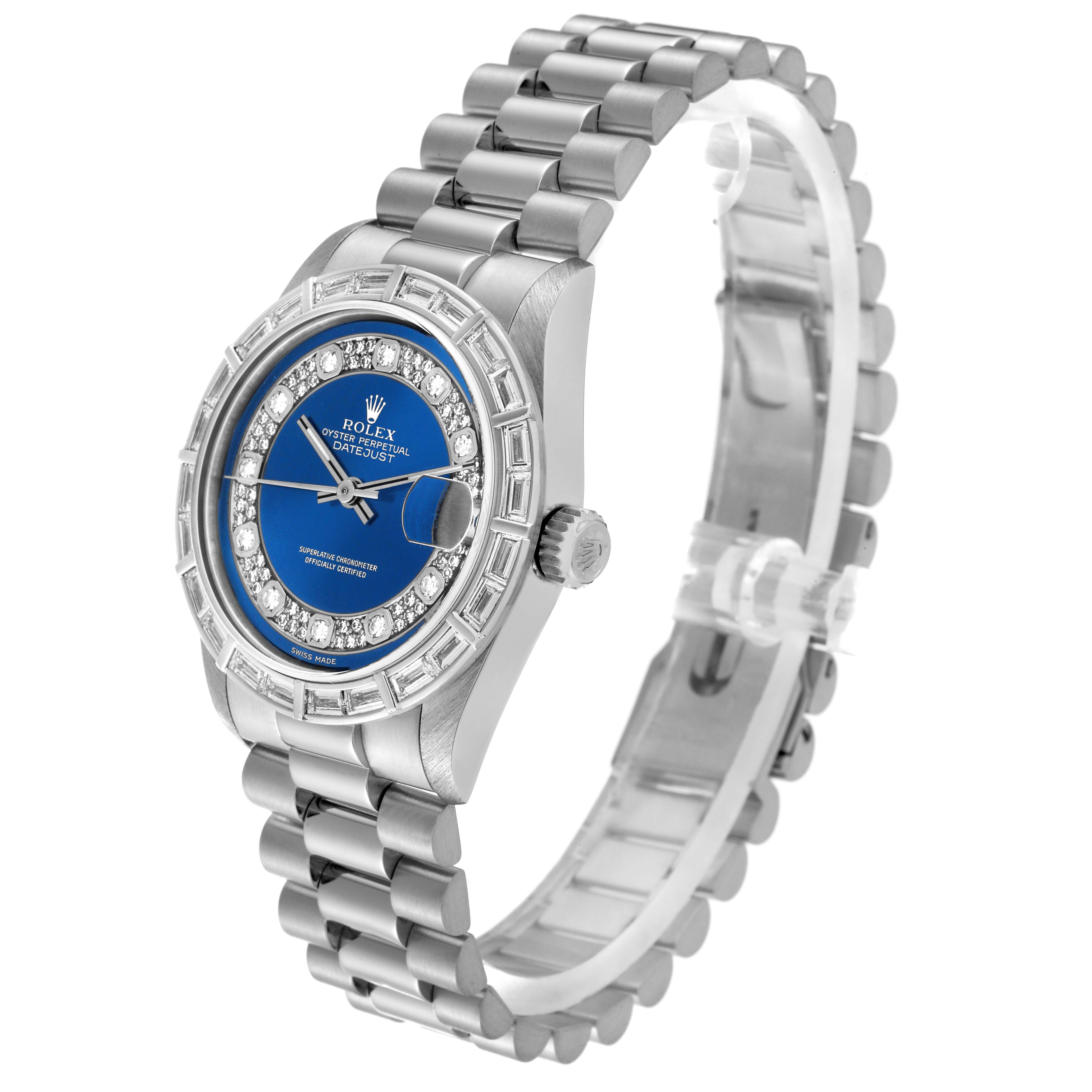 The image shows a Rolex President 68266 Women
s Platinum Blue Dial 68266 Women
s Platinum Blue Dial model watch at a three-quarter view, highlighting its band, case, crown, and dial.