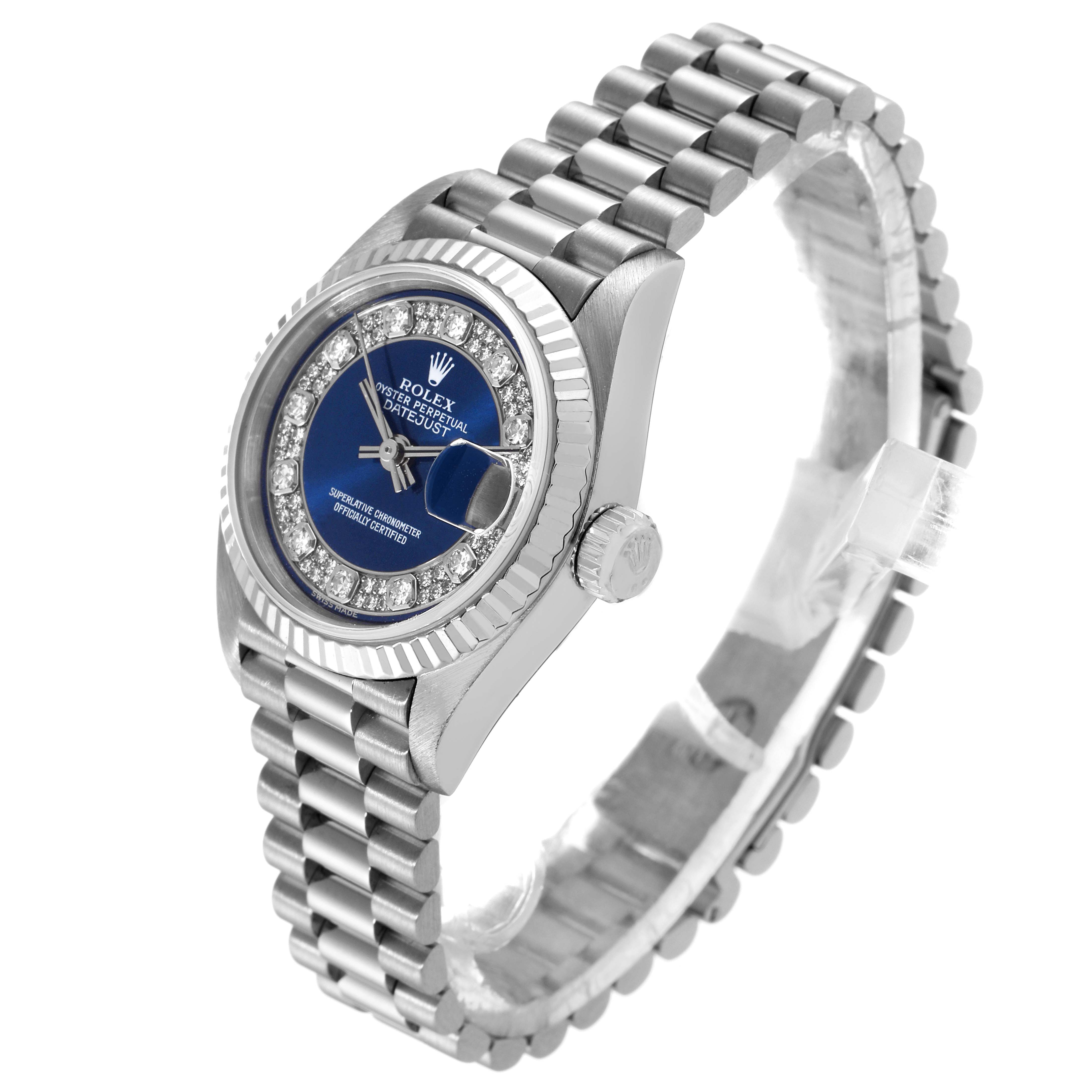 The image shows a Rolex President 69179 Women's White Gold Blue Dial 69179 Women's White Gold Blue Dial model watch at a three-quarter angle, highlighting its dial, bezel, crown, and bracelet.