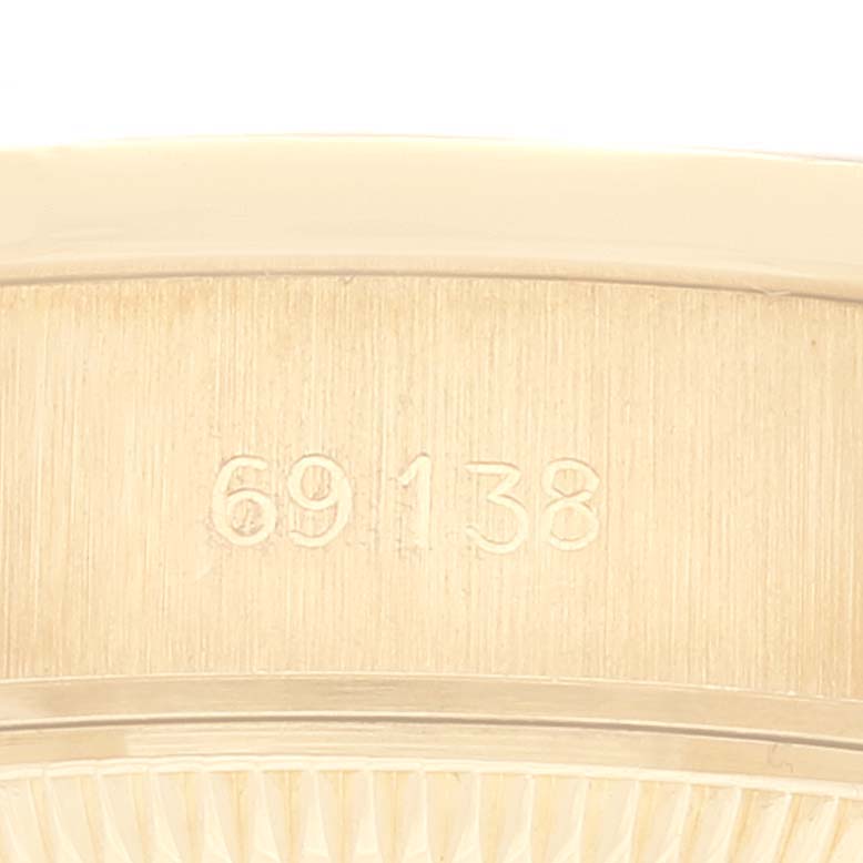This image shows a close-up of the model number "69138" on the President model by Rolex.
