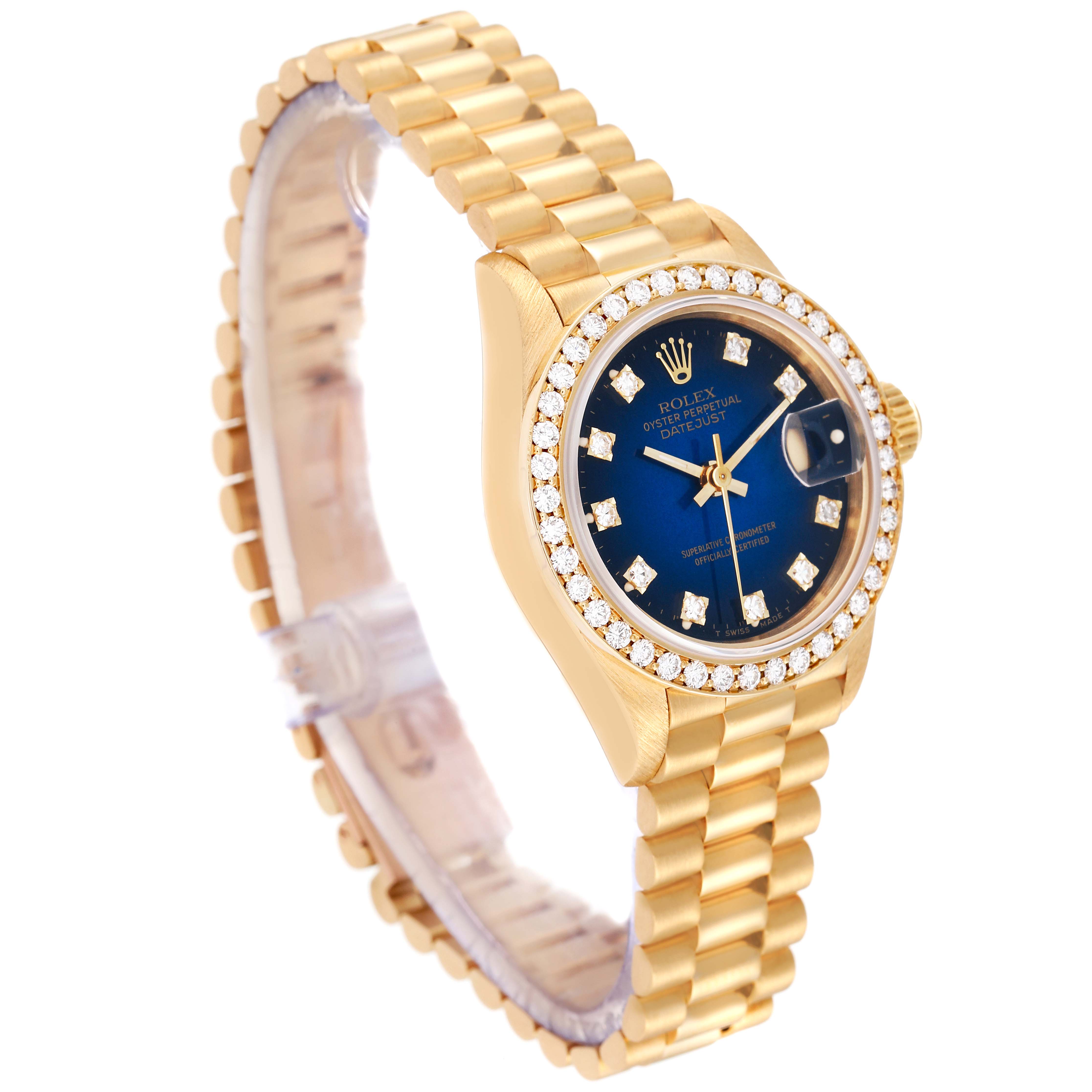 The Rolex President 69138 Women's Yellow Gold Blue Dial 69138 Women's Yellow Gold Blue Dial model watch is shown at a three-quarter angle, highlighting its bracelet, diamond bezel, and blue dial.