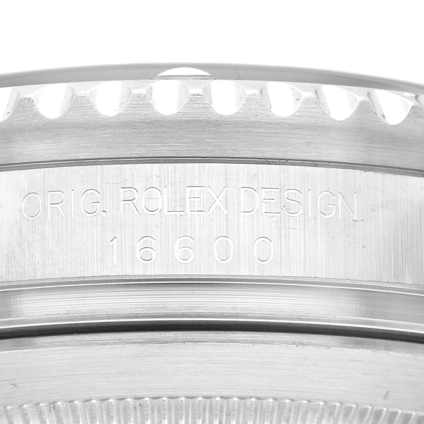 The image shows the side of a Rolex Sea-Dweller 16600 Men
s Stainless Steel Black Dial 16600 Men
s Stainless Steel Black Dial watch with "ORIG. ROLEX DESIGN" and the model number "16600" engraved.