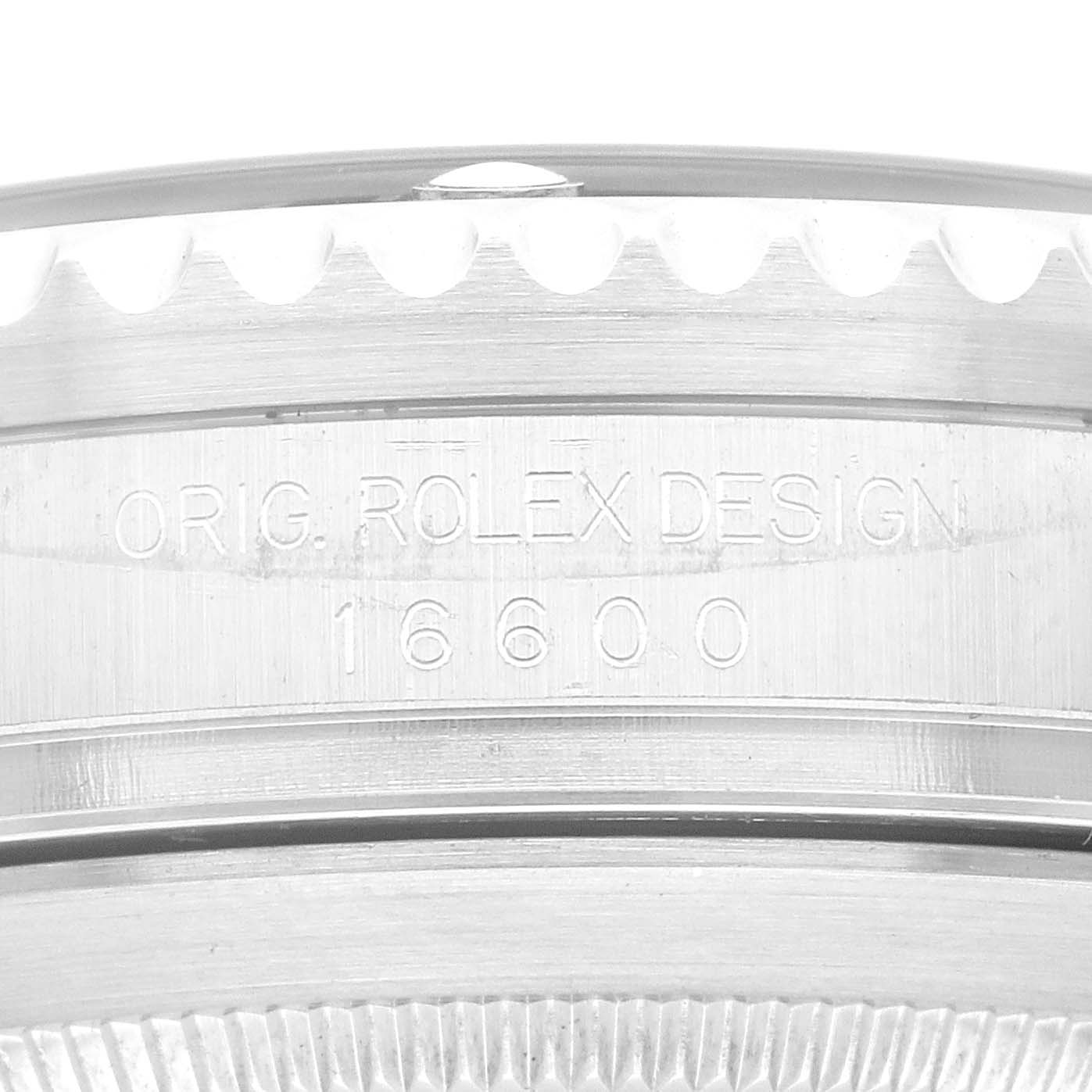 The image shows the side view of the bezel and engraved lugs of the Rolex Sea-Dweller 16600 Men
s Stainless Steel Black Dial 16600 Men
s Stainless Steel Black Dial model, displaying "ORIG. ROLEX DESIGN 16600."