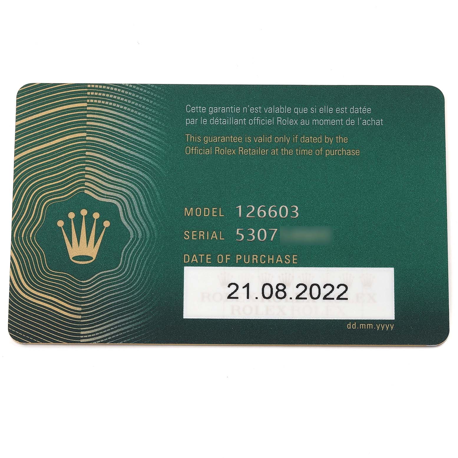 The image shows a guarantee card for the Rolex Sea-Dweller 126603 Men
s Steel and Gold (two tone) Black Dial 126603 Men
s Steel and Gold (two tone) Black Dial model 126603, displaying its serial number and purchase date.