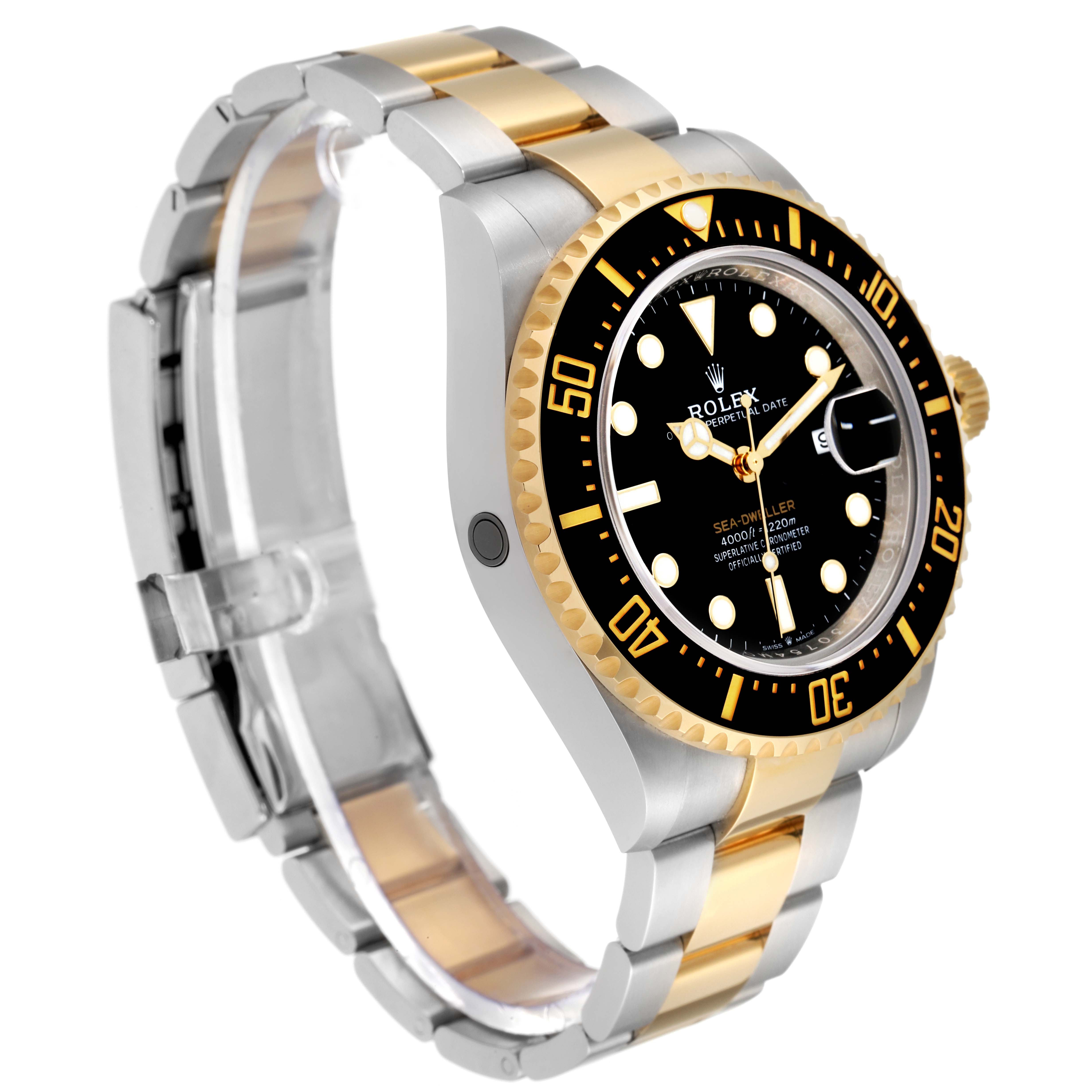 The image shows a Rolex Sea-Dweller 126603 Men
s Steel and Gold (two tone) Black Dial 126603 Men
s Steel and Gold (two tone) Black Dial watch at an angled side view, highlighting its black dial, two-tone bracelet, and bezel.
