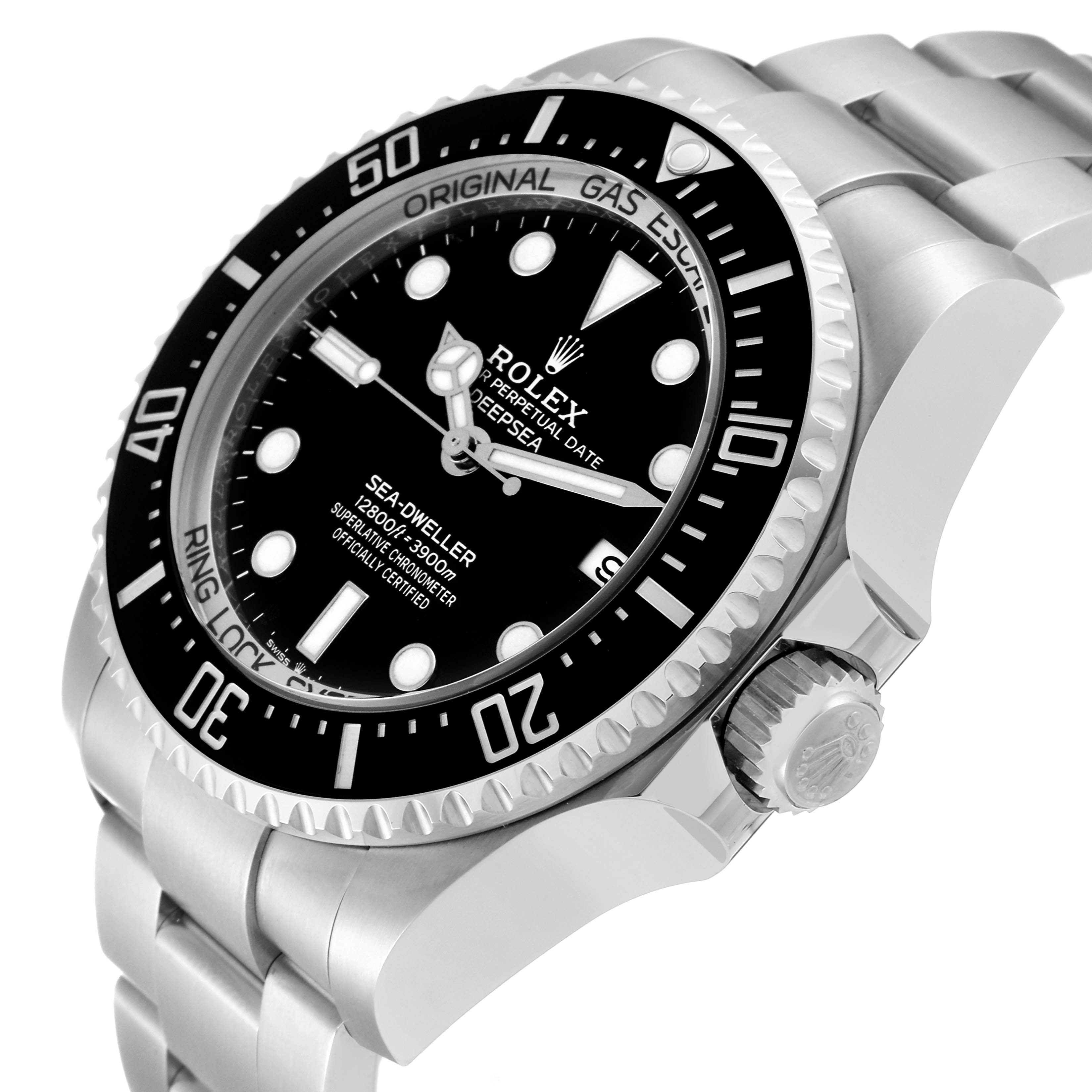 The image shows a close-up angle of the Rolex Sea-Dweller 136660 Men
s Stainless Steel Black Dial 136660 Men
s Stainless Steel Black Dial watch, capturing its dial, bezel, crown, and part of the metal bracelet.