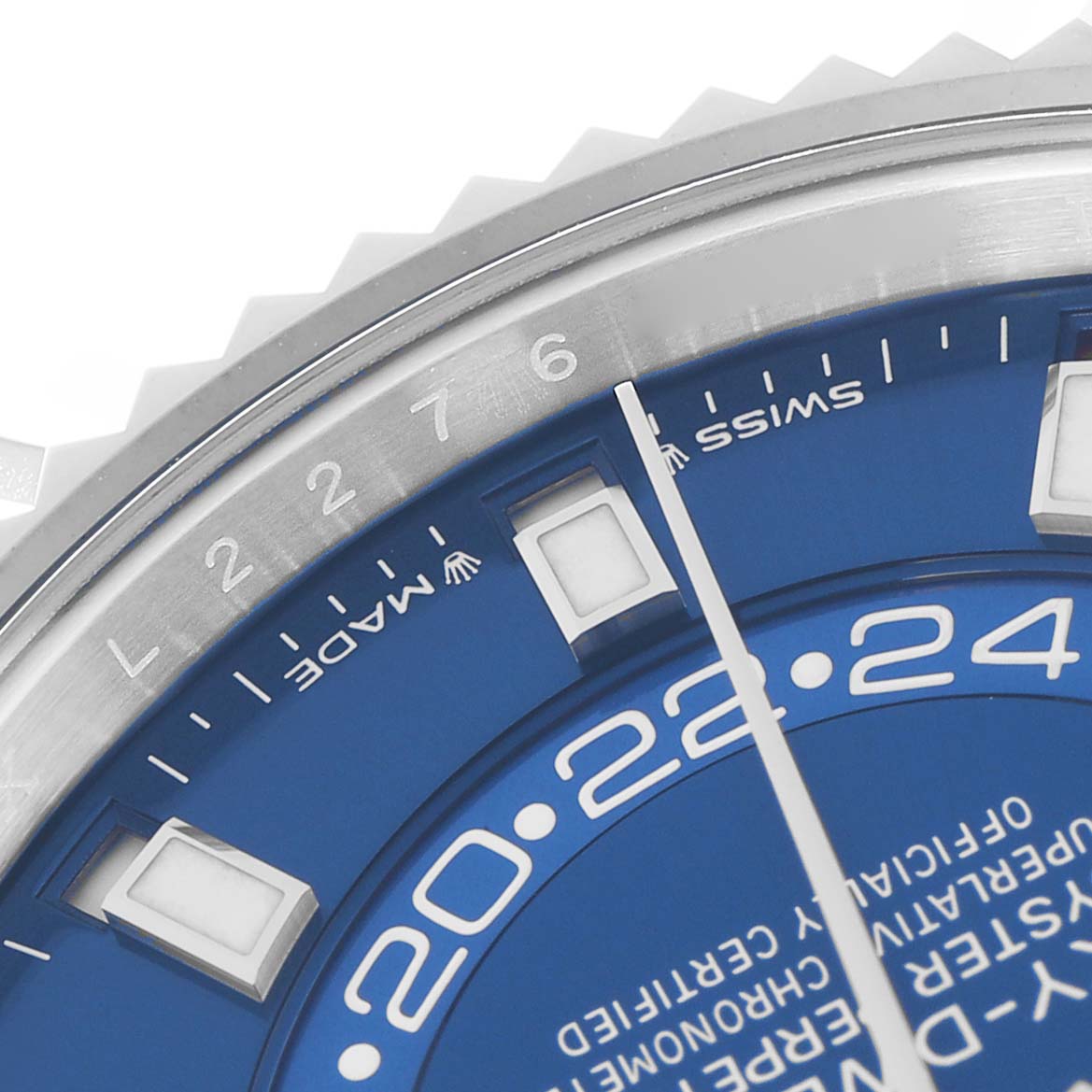 This close-up image shows the dial and bezel of the Rolex Sky-Dweller 336934 Men
s Stainless Steel Blue Dial 336934 Men
s Stainless Steel Blue Dial, highlighting the hour markers and part of the blue dial.