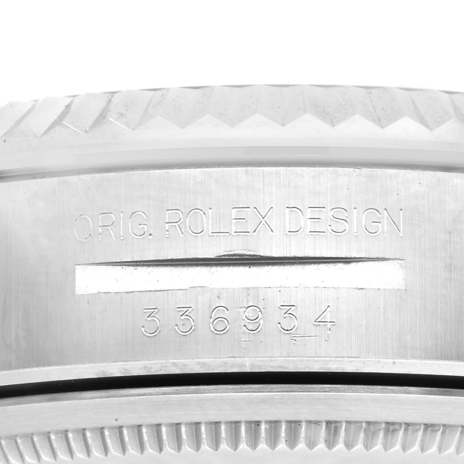 The image shows a close-up of the side of a Rolex Sky-Dweller 336934 Men
s Stainless Steel Blue Dial 336934 Men
s Stainless Steel Blue Dial, highlighting the engraved model and design details.