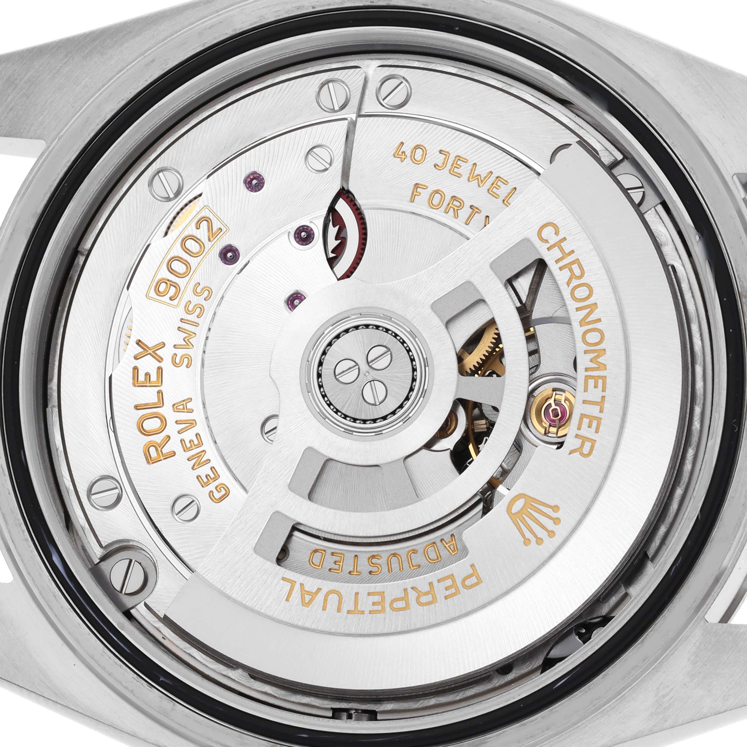 The image shows the movement of a Rolex Sky-Dweller 336934 Men
s Stainless Steel Blue Dial 336934 Men
s Stainless Steel Blue Dial watch viewed from the back, highlighting its mechanism and engravings.