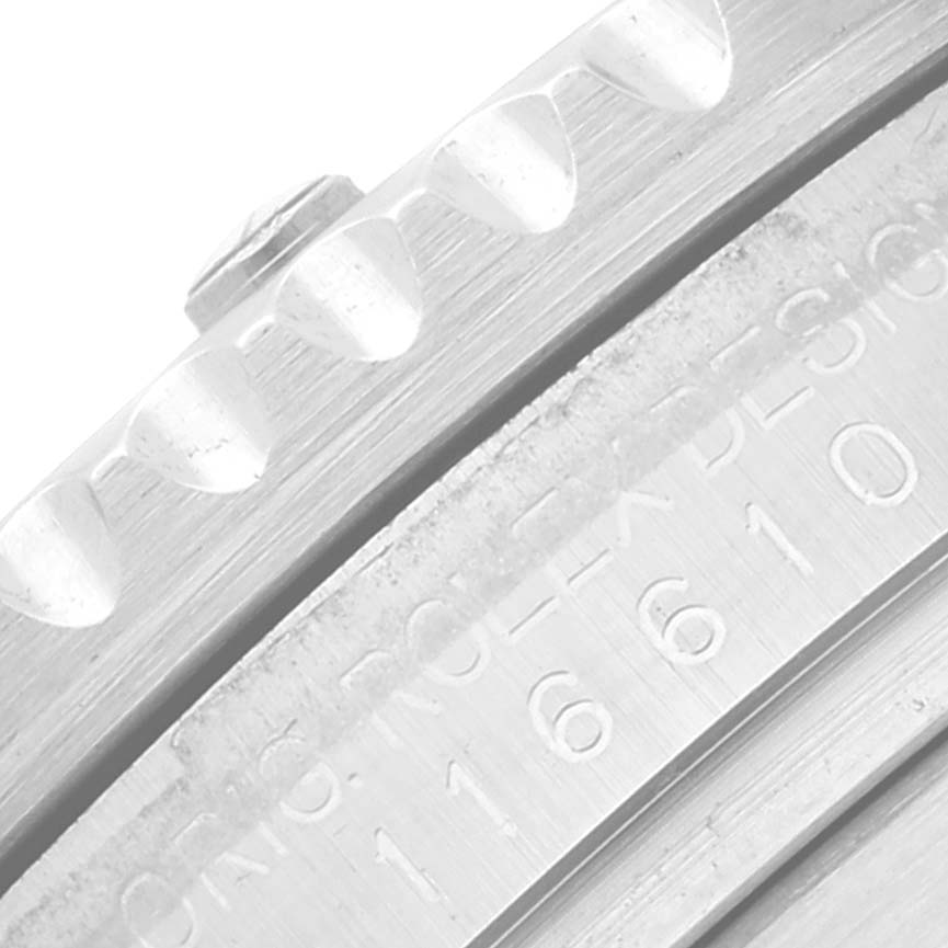 This image shows a close-up of the bezel and rehaut of a Rolex Submariner 116610LV Men
s Stainless Steel Green Dial 116610LV Men
s Stainless Steel Green Dial, highlighting the engraved model number.