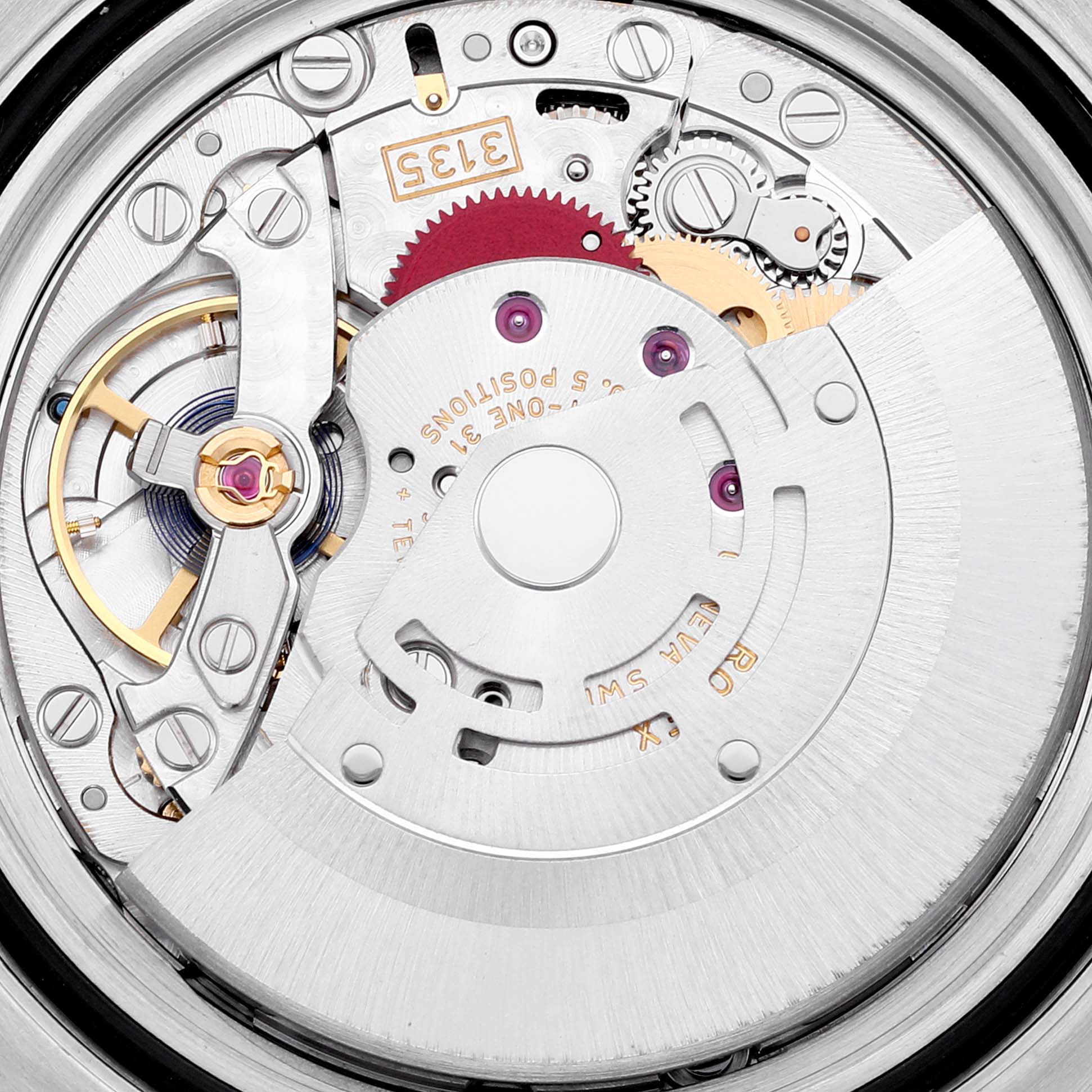 This image shows a close-up view of the movement mechanism inside a Rolex Submariner 116610LV Men
s Stainless Steel Green Dial 116610LV Men
s Stainless Steel Green Dial watch.