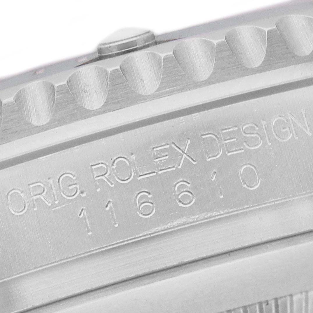 The image shows a close-up of the Rolex Submariner 116610LV Men's Stainless Steel Green Dial's side, highlighting the engraved model number and part of the bezel.