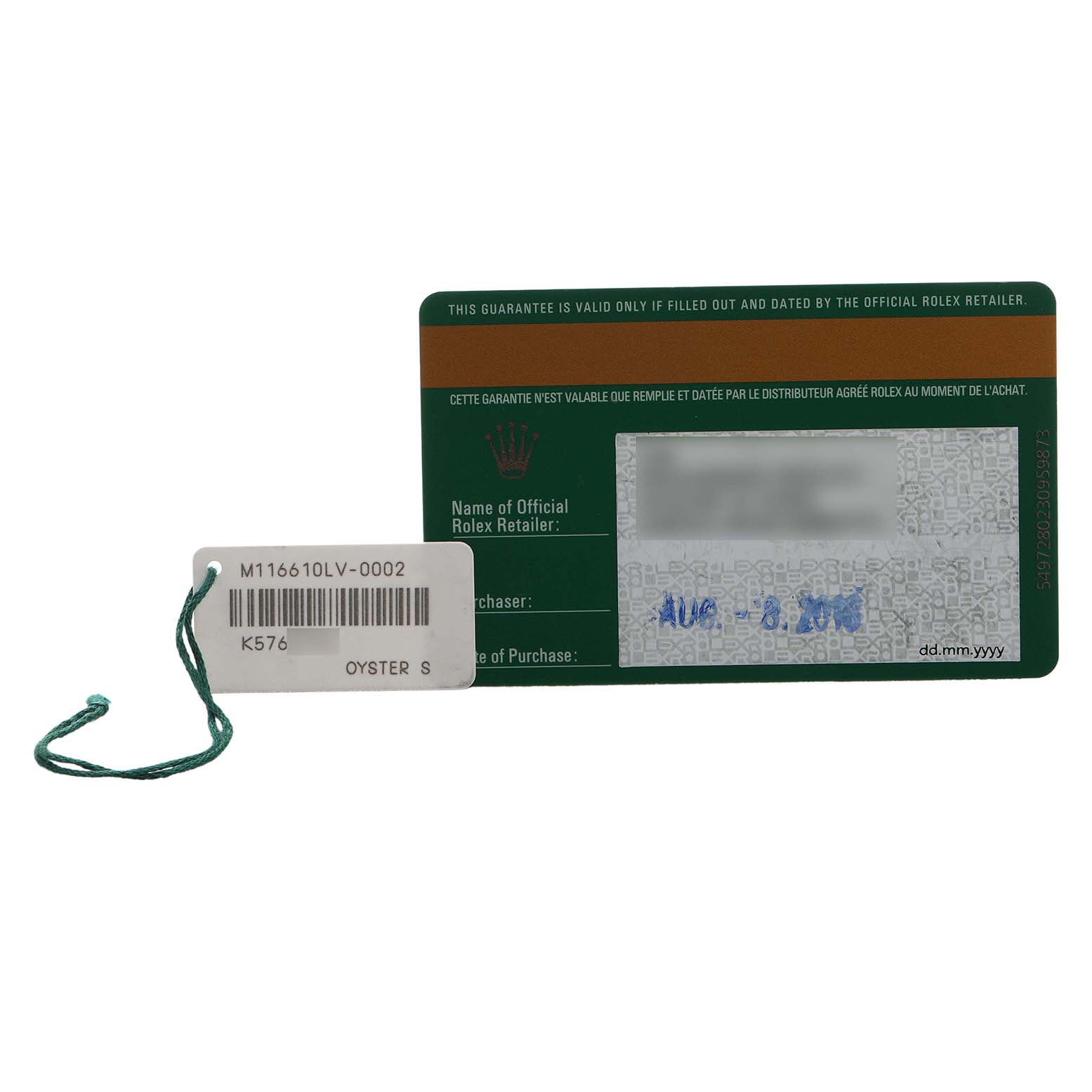 The image shows a warranty card and a tag for the Rolex Submariner 116610LV Men's Stainless Steel Green Dial watch model, viewed from above.