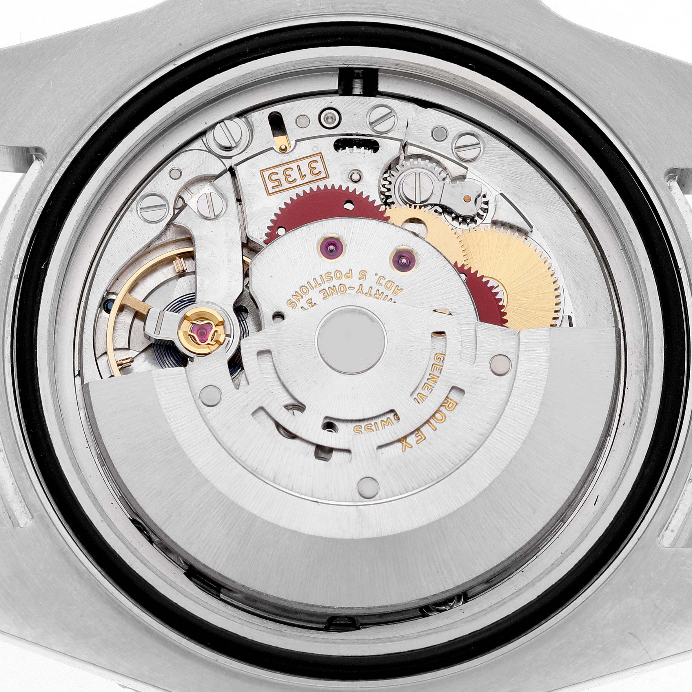 The image shows the movement mechanism of a Rolex Submariner 116610LV Men's Stainless Steel Green Dial watch, viewed from the back.