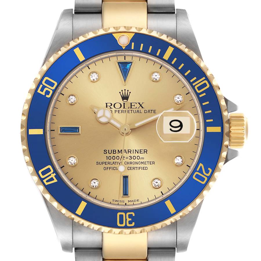 The Rolex Submariner watch is shown from the front, displaying its blue and gold bezel, dial, and bracelet.
