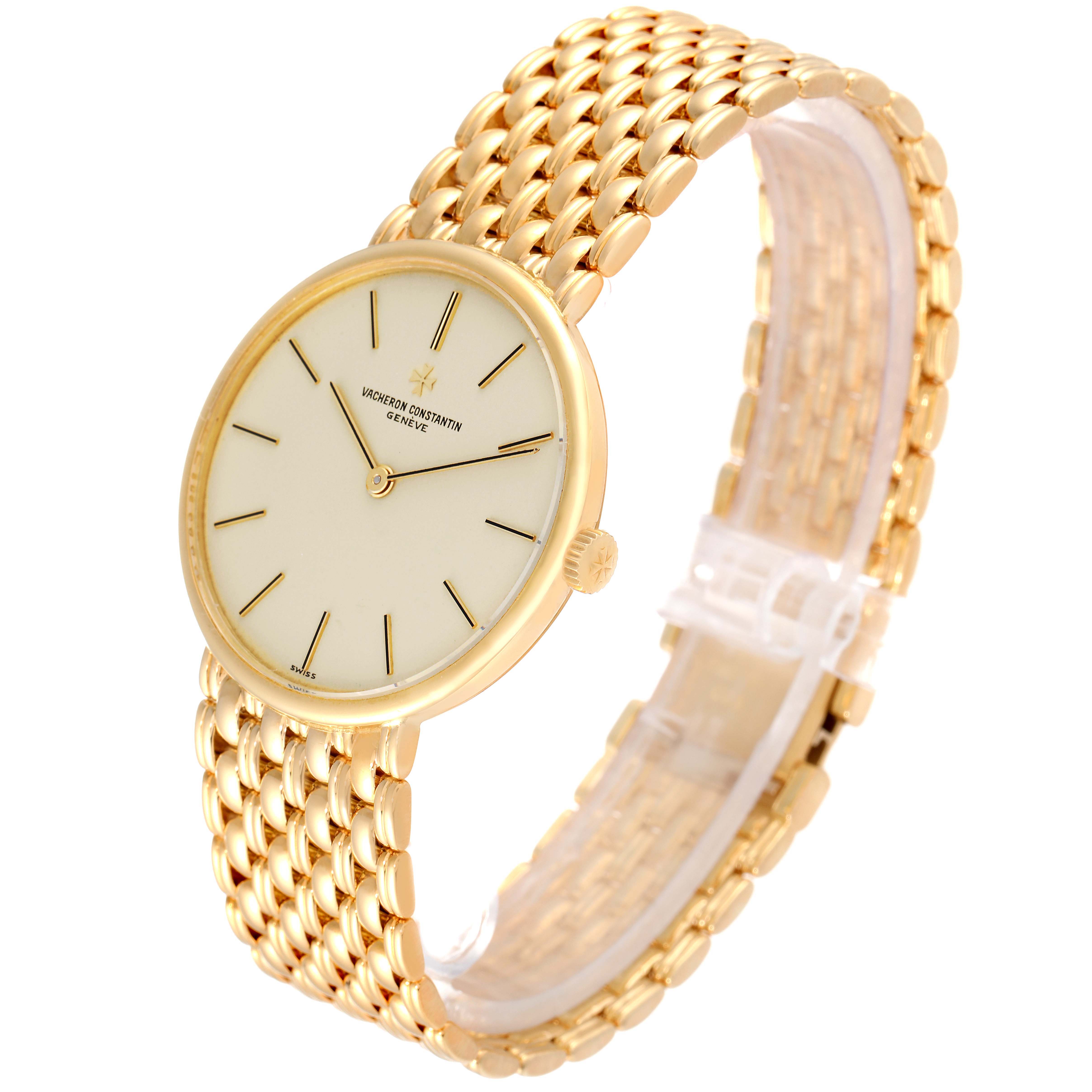 The vintage Vacheron Constantin watch is shown at an angle displaying the face, dial, and part of the gold woven bracelet.
